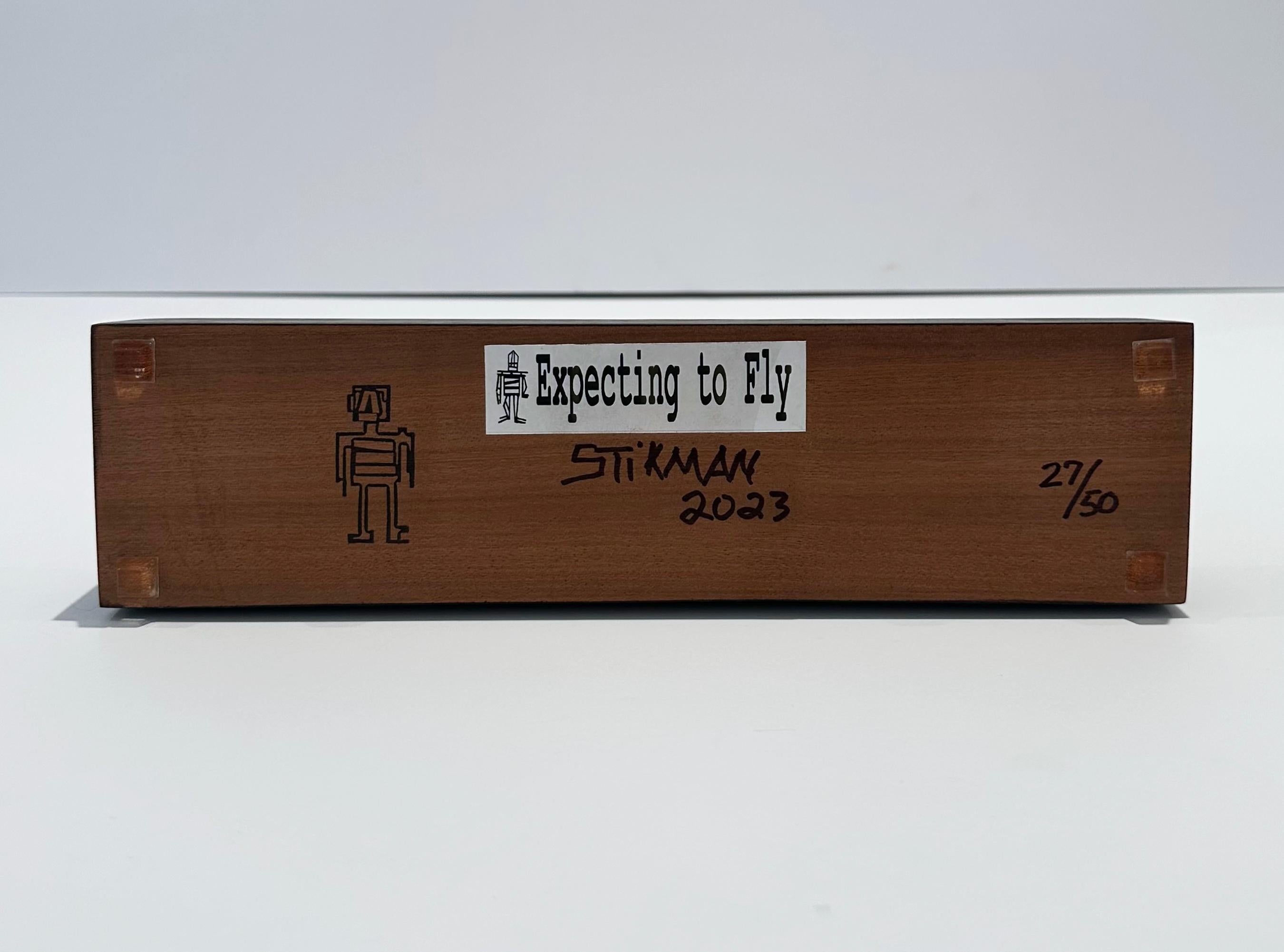 Artistics: Stikman
Titolo: Aspettando di volare
Mezzo: Scultura in acciaio verniciato a polvere tagliata al laser su base in legno
Data: 2023
Edizione: 27/50
Dimensioni: 15 1/2