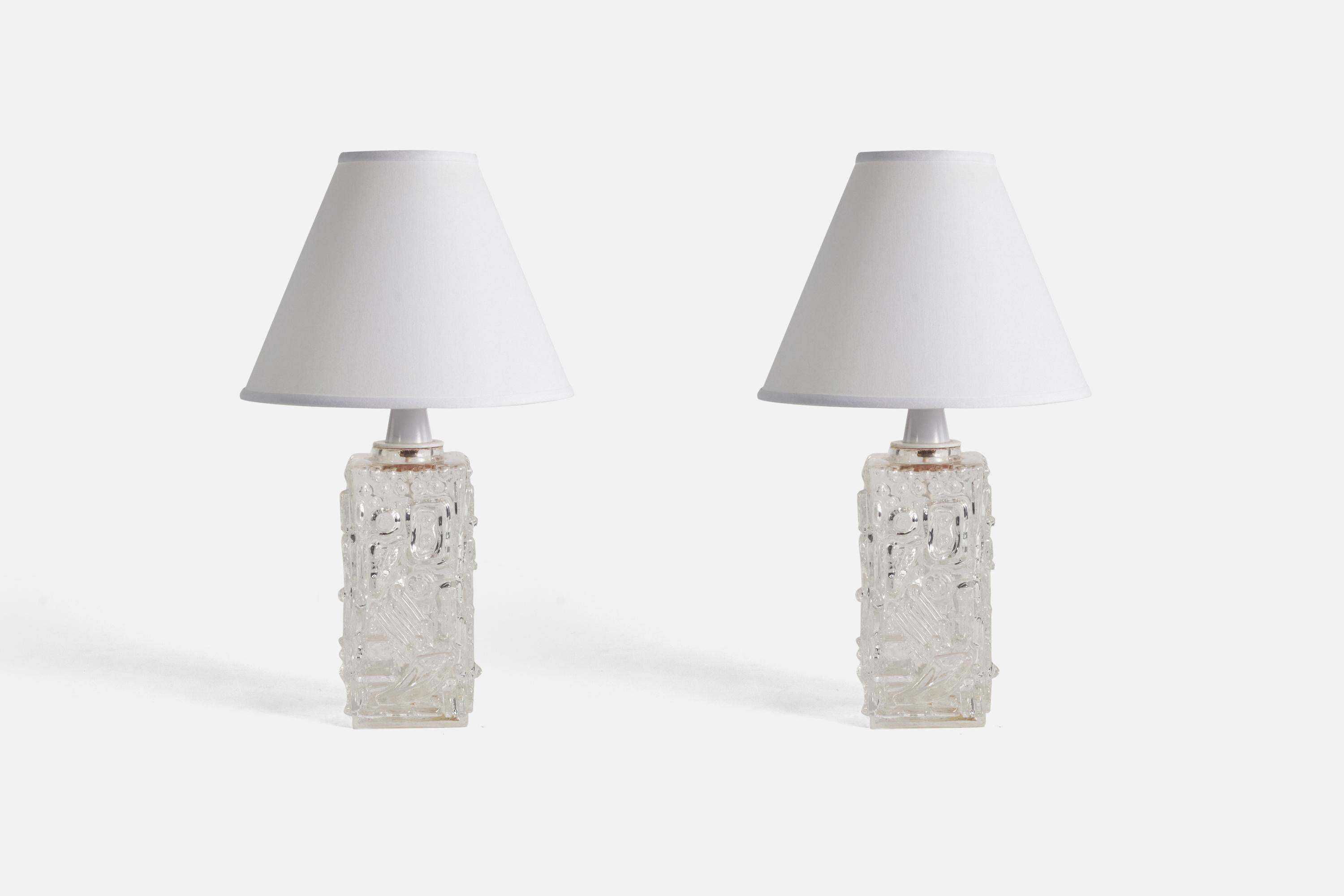 A pair of glass table lamps designed and produced by AB Stilarmatur, Tranås, Sweden, 1960s. 

Sold without Lampshade(s).
Dimensions of Lamp (inches) : 12.75 x 4.6 x 4.37 (Height x Width x Depth)
Dimensions of Shade (inches) : 4 x 10 x 8 (Top