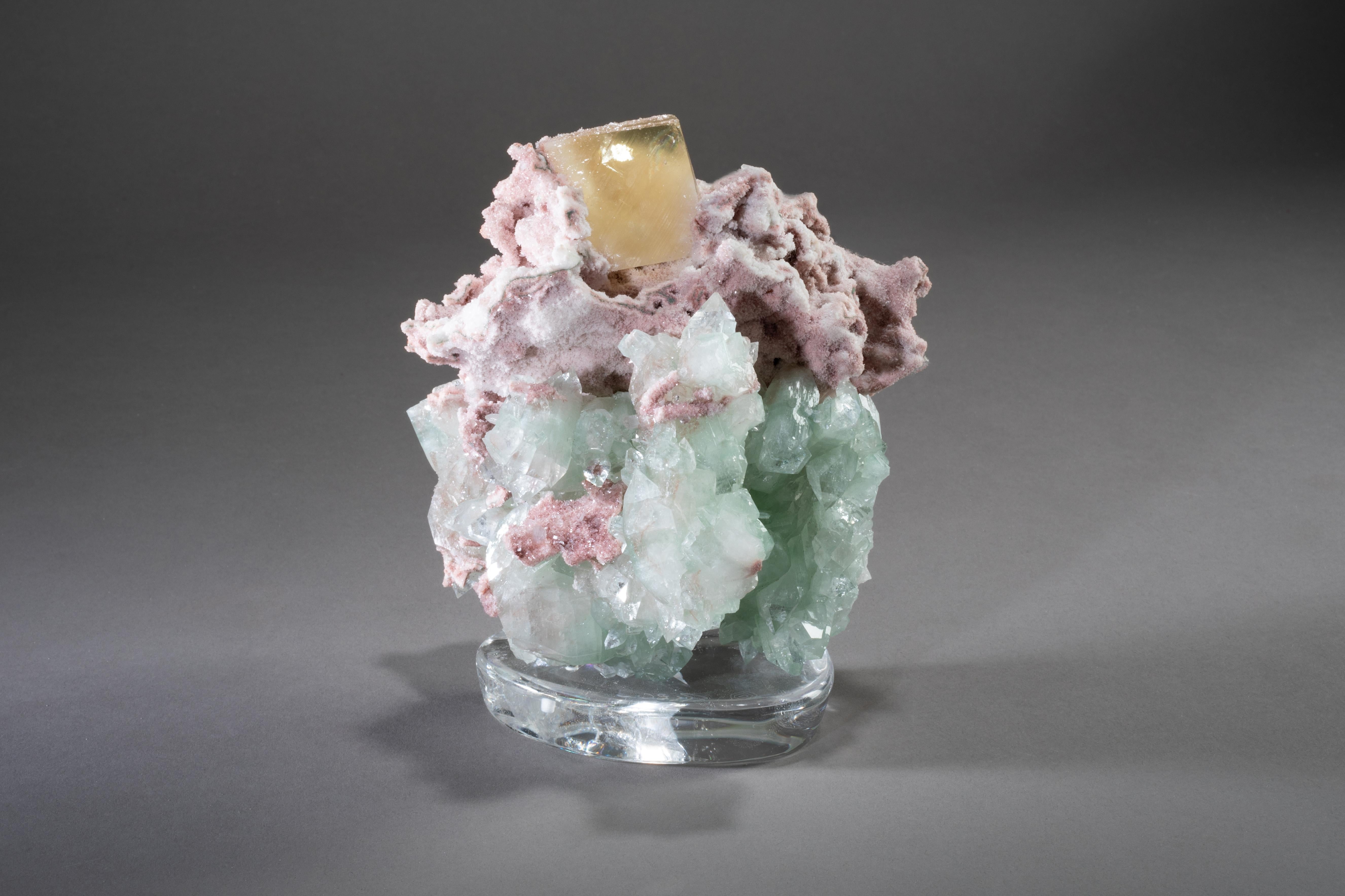 Stillbite, calcite and apophyllite on rock crystal base.