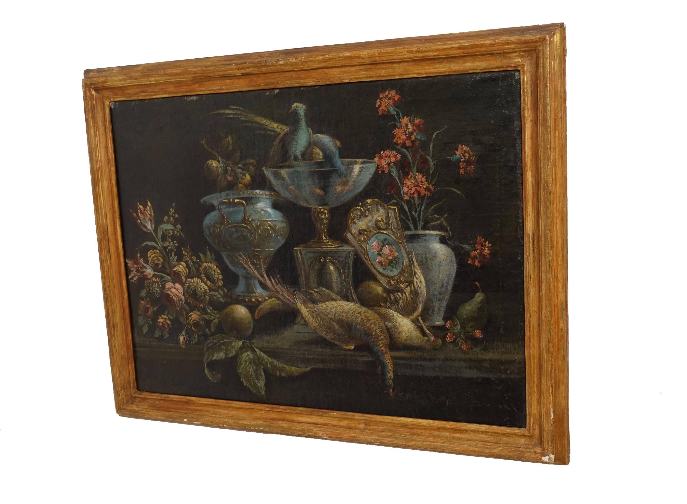 Striking still life oil painting on canvas. The scene of birds with Venetian glass' and flowers. Painted on canvas and later relined. The frames with hints of gold gilt remaining, Continental, early to mid-19th century.
 