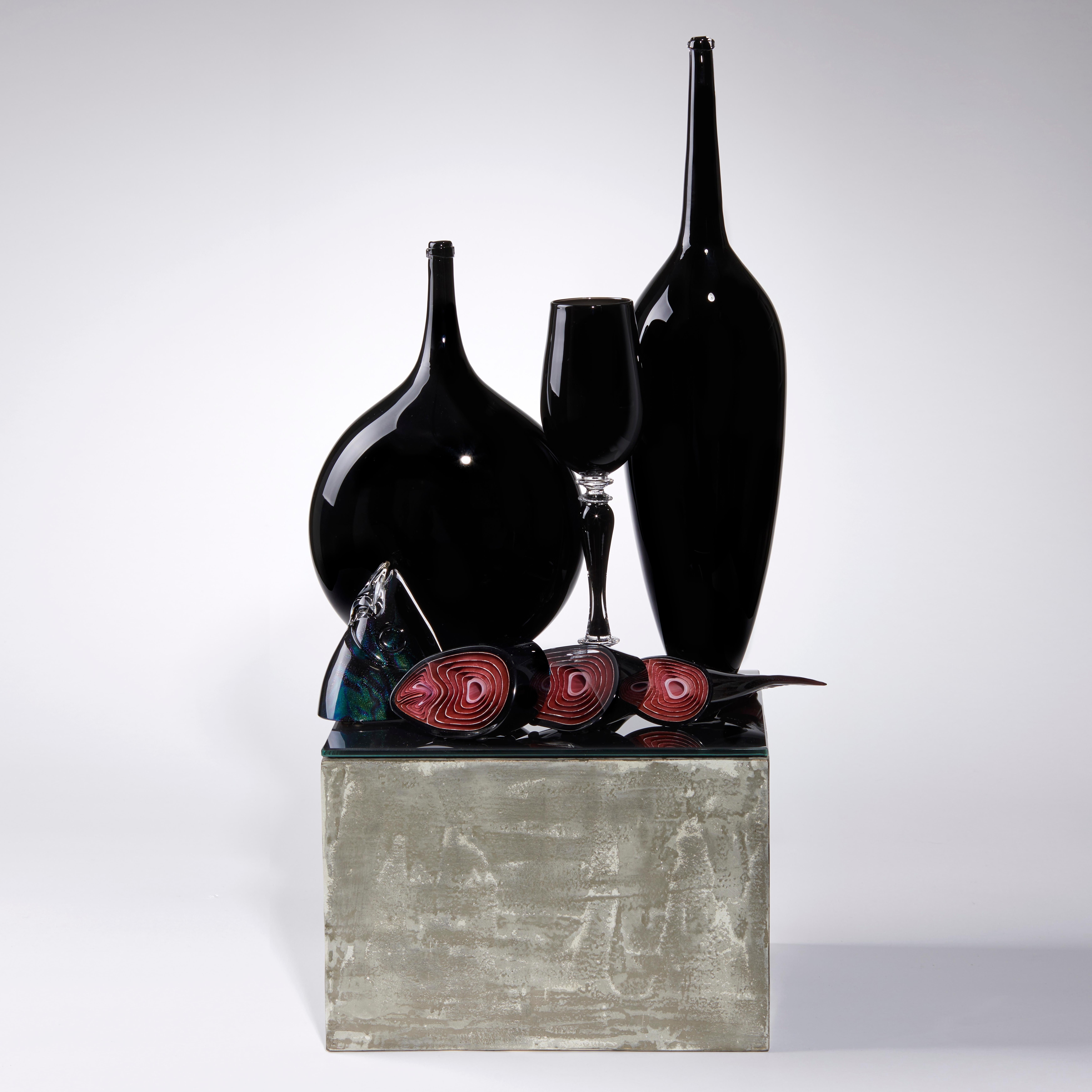 'Still life with fish' is a glass sculpture from the British artist and Blown Away II series winner, Elliot Walker's ongoing body of unique still life artworks. Freehand sculpted in black, red and clear glass with iridescent detail, the piece