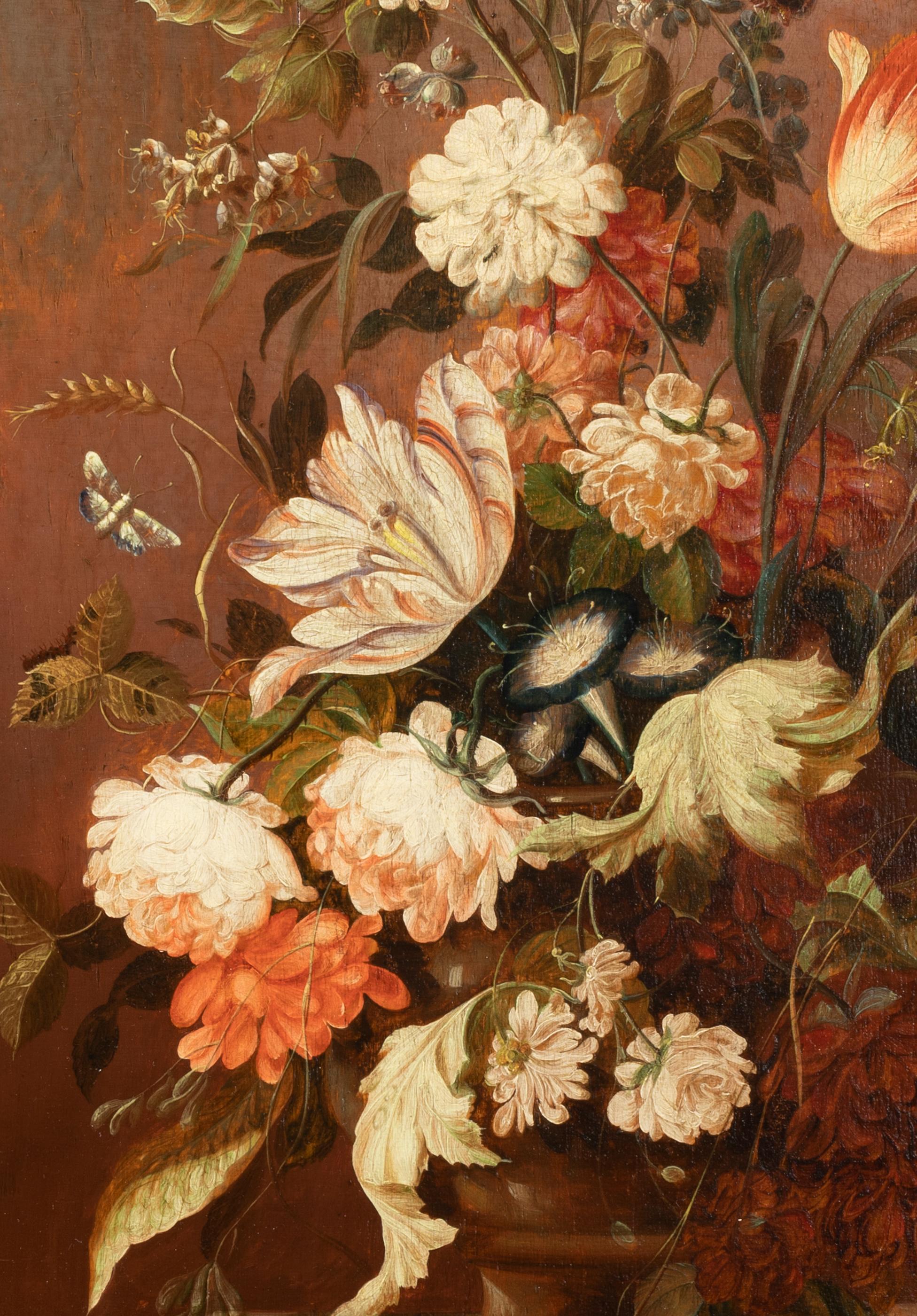Still life representing flowers in a vase placed on an entablature.
Parquet panel, monogrammed 