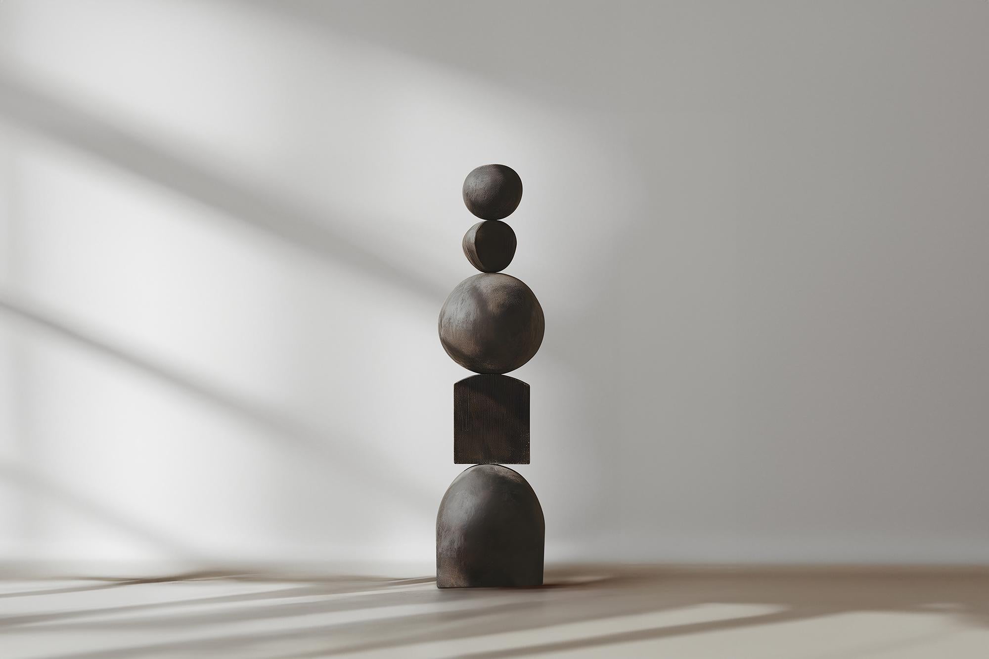 Still Stand No86 Reveals Dark Elegance in a Carved Burned Oak Totem

——


Joel Escalona's wooden standing sculptures are objects of raw beauty and serene grace. Each one is a testament to the power of the material, with smooth curves that flow into