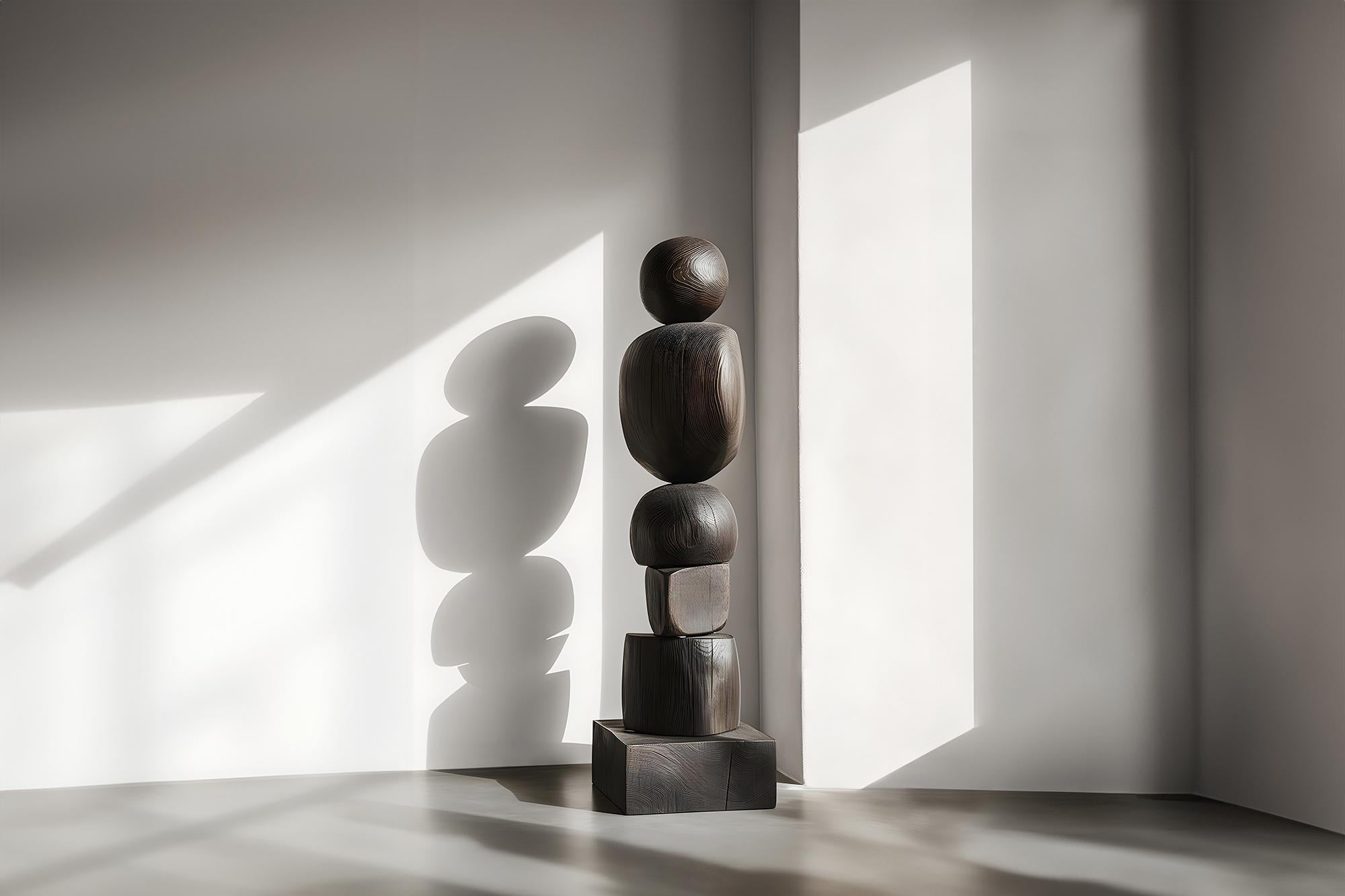 Still Stand No90, The Sleek Burned Oak Totem, a Synthesis of Dark Elegance
——


Joel Escalona's wooden standing sculptures are objects of raw beauty and serene grace. Each one is a testament to the power of the material, with smooth curves that flow