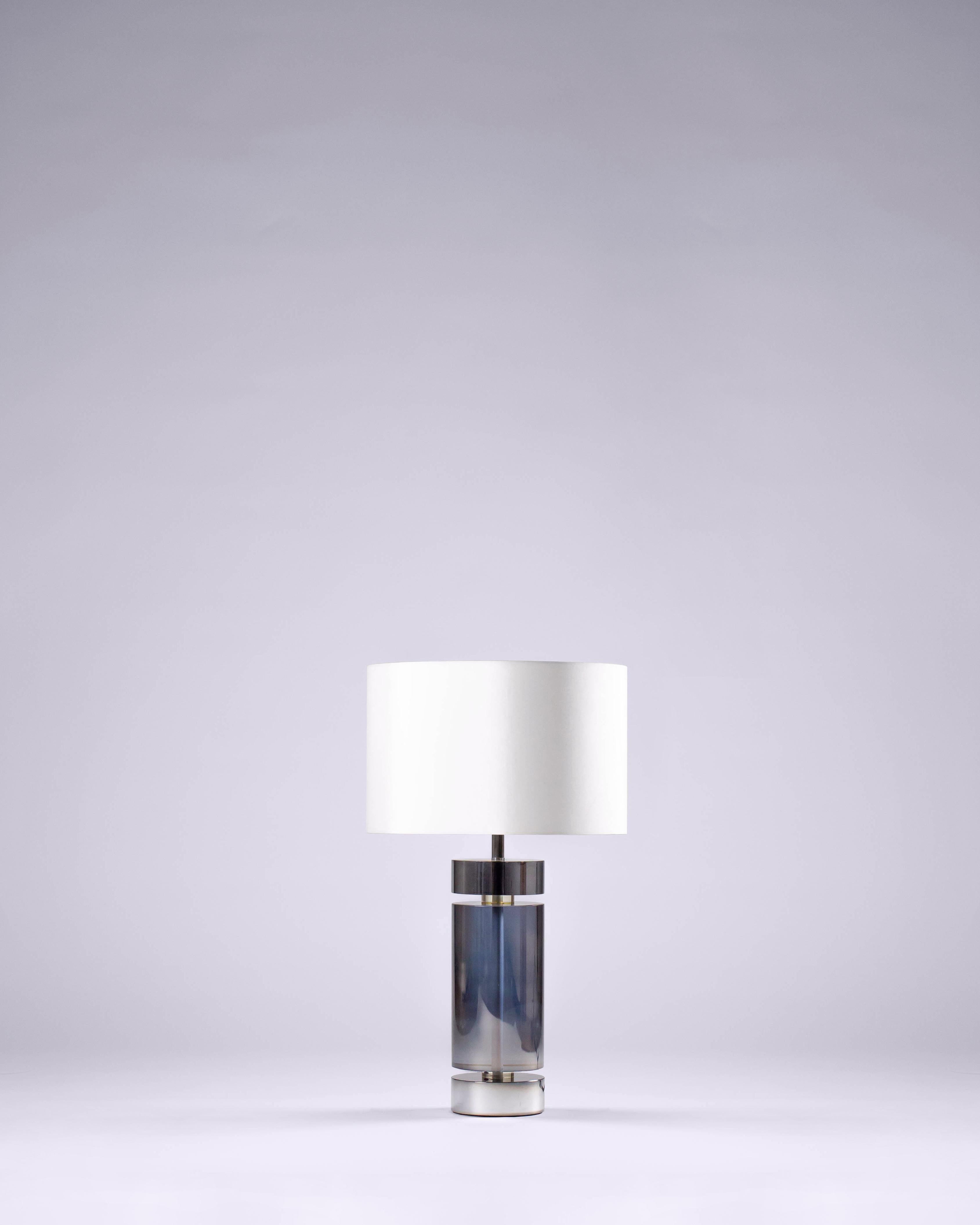 Still Table Lamp by G.Luce
Dimensions: D 43 x H 70 cm
Materials: Crystal Cylinders of the Structure with Polished Chrome Supports and a Circular Lampshade.
Weight: 15 Kg. 

G.Luce is the result of a thirty-year history of commitment, research and