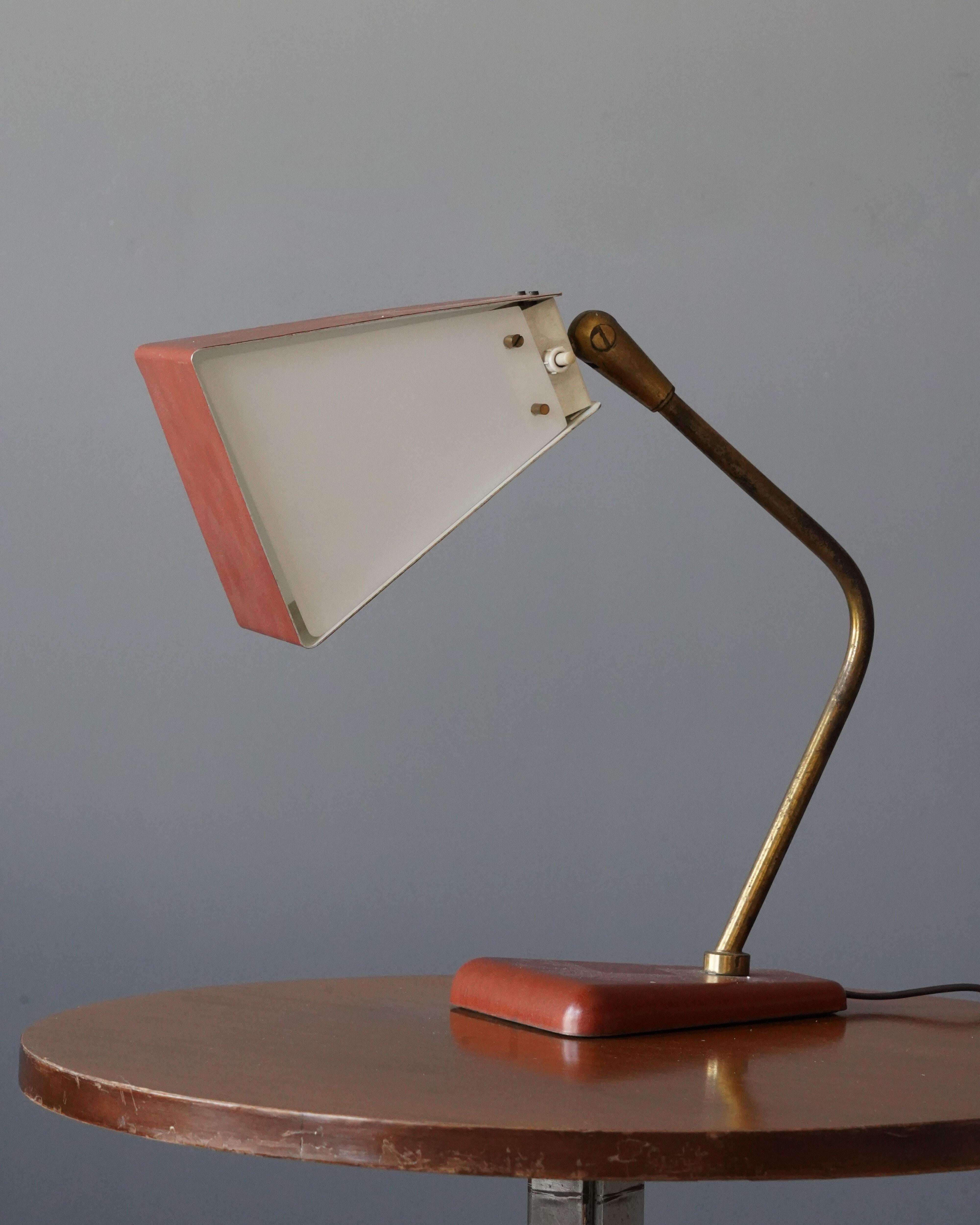 A rare Minimalist table or desk lamp. Produced by Stilnovo, Milan, Italy, 1950s.

Other designers of the period include Max Ingrand, Gino Sarfatti, Achille Castiglioni, Gio Ponti, and Angelo Lelii.
