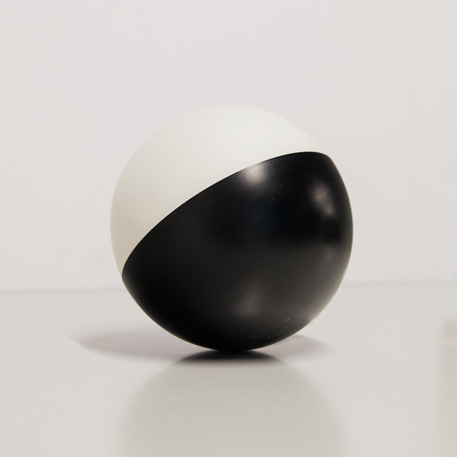 Ball lamp designed in painted black and milk glass with the original Stilnovo sticker made in Italy, 1960s.
