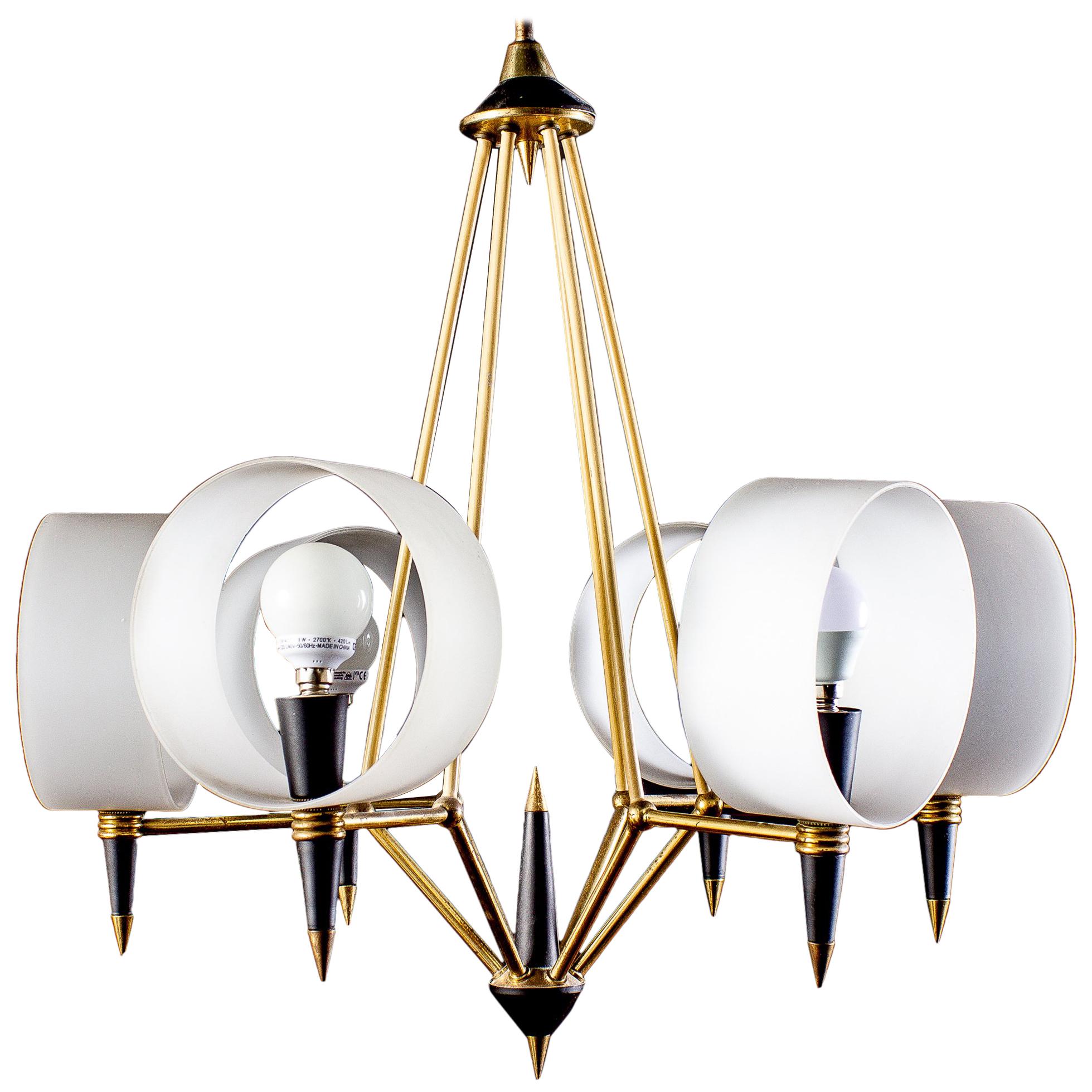 Linear elegance, brass and black painted six arms chandelier, holding round opaline glass shades. Excellent vintage condition.
Six E14 light bulbs.
 