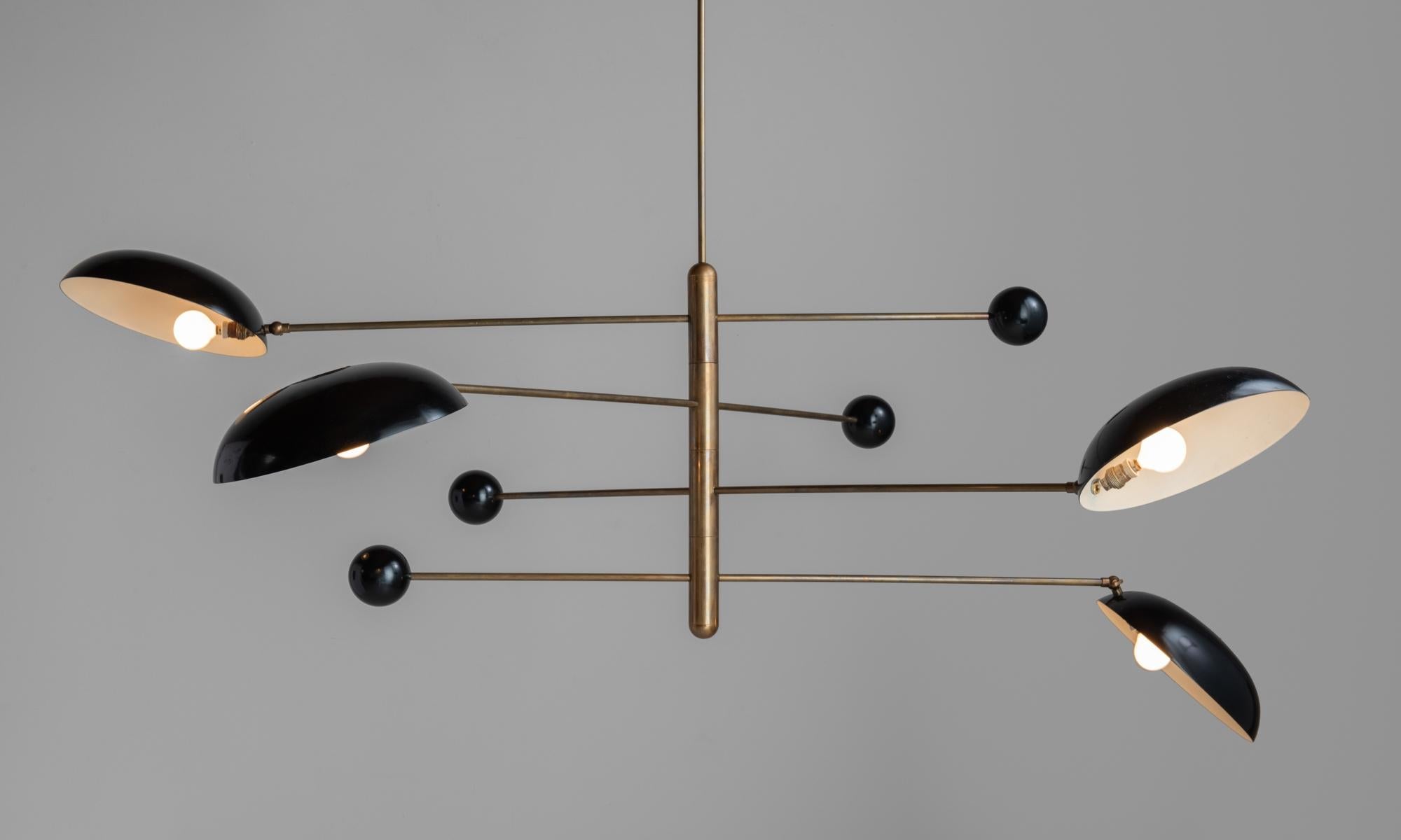 Modern counterbalance ceiling lamp, Italy, circa 1950

In the style of Stilnovo. Elegant form with (4) counterbalanced, adjustable lights with brass hardware.