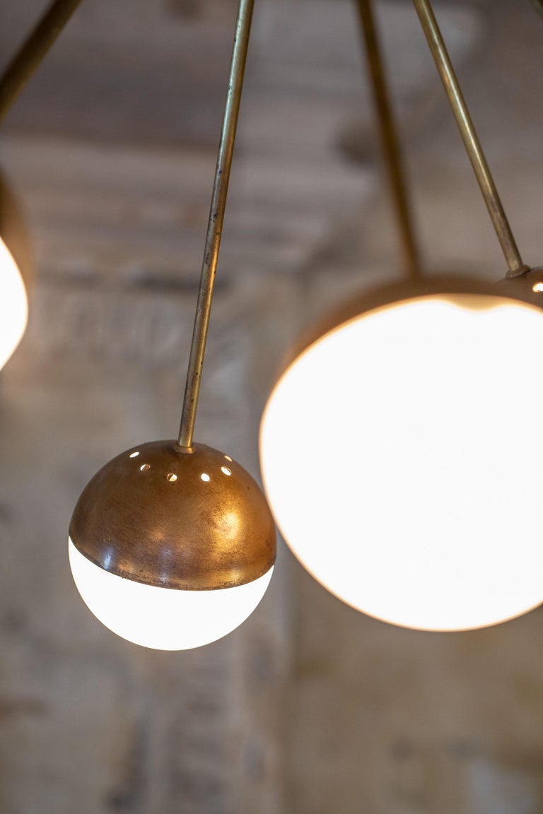Iconic pendant by Stilnovo.
6 Lights, brass arms and canopy, original opaline glass balls.
Excellent condition, beautiful brass patina.