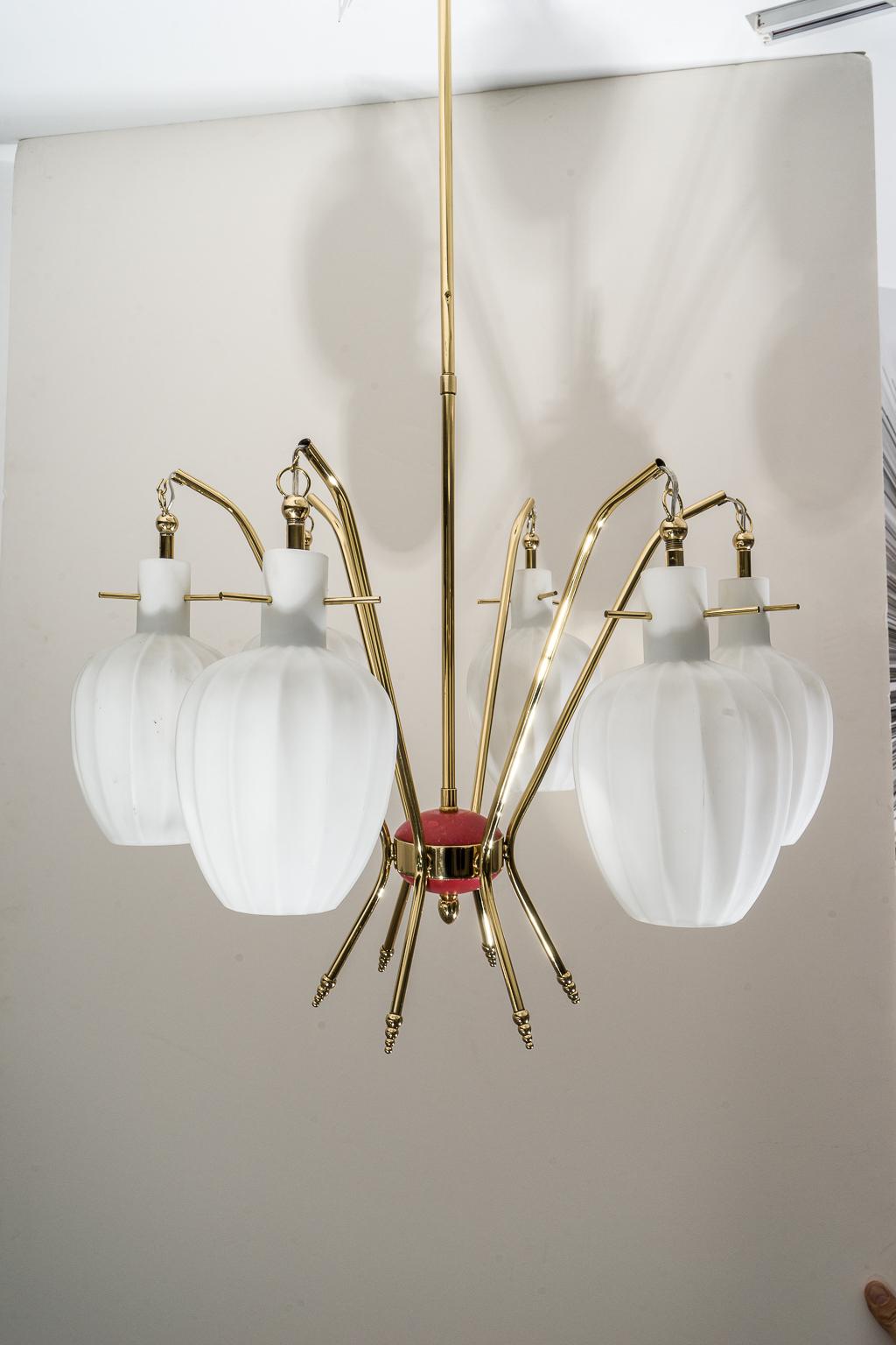 This stylish and chic chandelier dates to the 1950s-1960s and is very much in the style of Stilnovo. 

The piece takes on the motif of rice paper lanterns. Fabricated in Murano glass.

Note: This piece has been professionally rewired as of May,