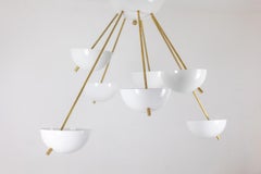 Stilnovo. Chandelier in gilded brass and white lacquered metal. Contemporary.