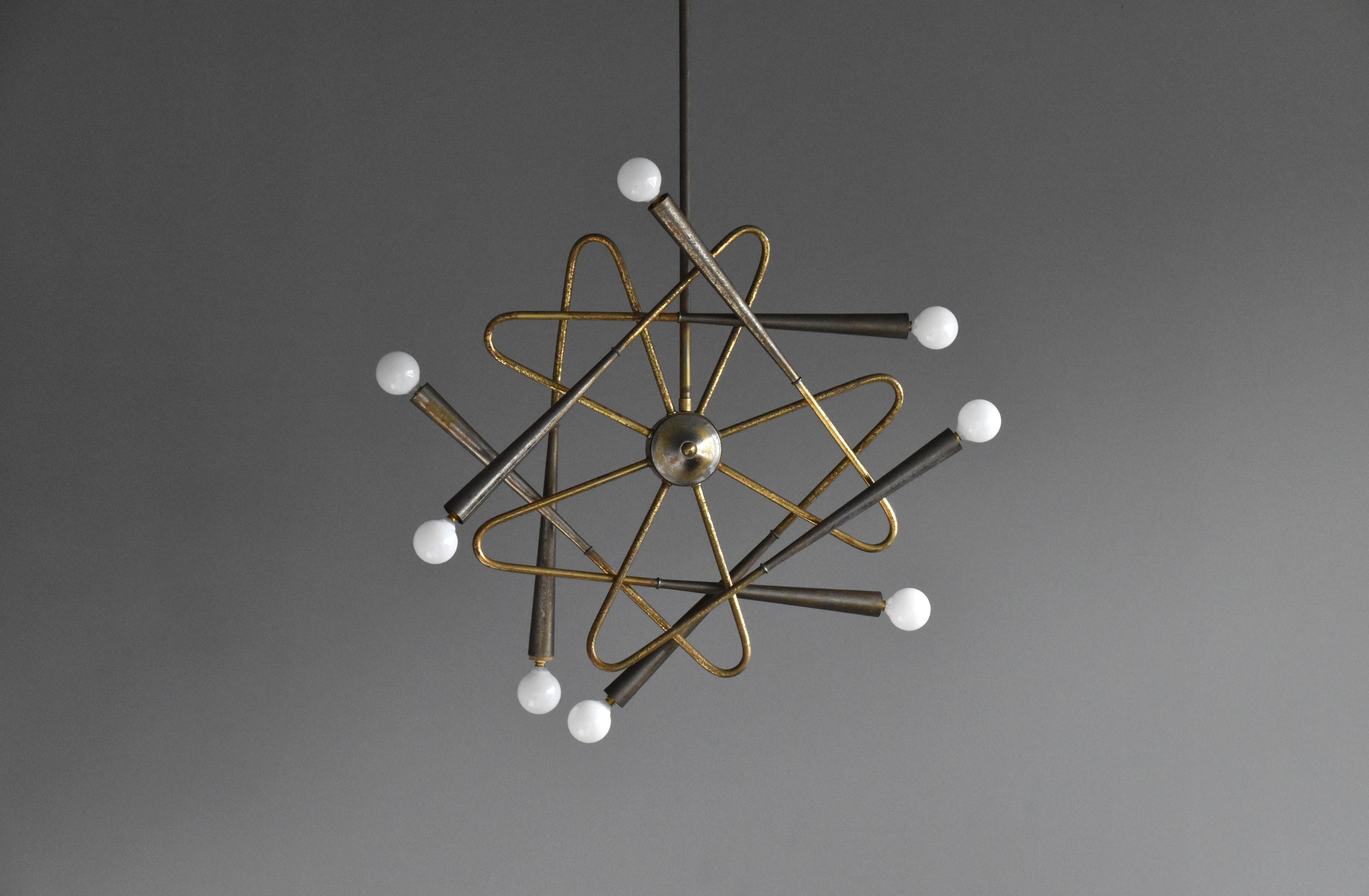 An adjustable eight-arm chandelier / ceiling lamp / pendant designed and produced by Stilnovo, Milan, Italy in the 1950s. 

A similar model Stilnovo lamp of similar dimensions achieved $40,000 at Phillips auction, Design December 13, 2018.

Other