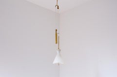 Stilnovo elegant brass and opaline glass bell-shaped chandelier.
