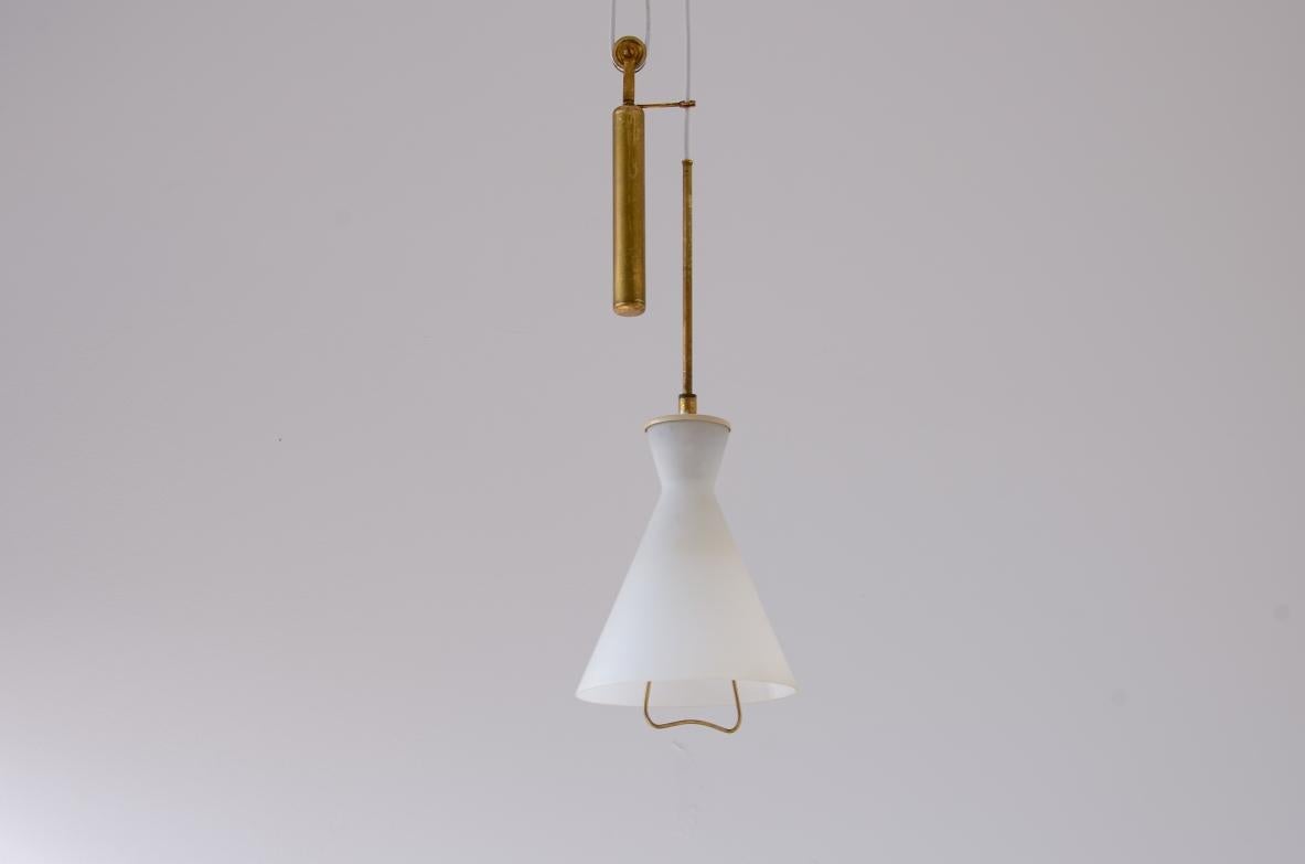 Mid-Century Modern Stilnovo elegant brass and opaline glass bell-shaped chandelier. For Sale