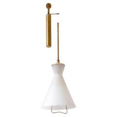 Stilnovo elegant brass and opaline glass bell-shaped chandelier.