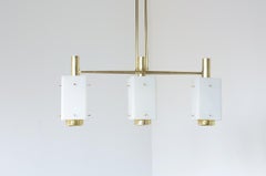 Stilnovo elegant three-light chandelier in brass by Bruno Gatta