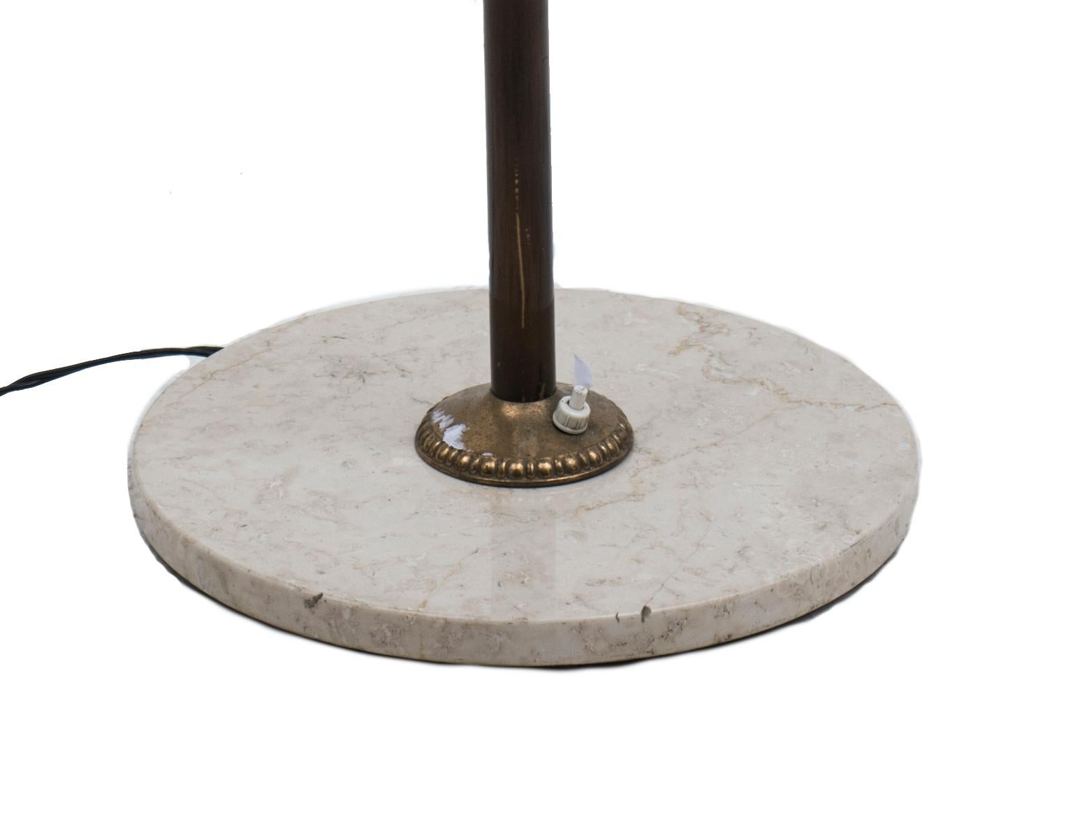 Floor lamp in brass and satin glass diffusers. Marble base.
Very good conditions.
This object is shipped from Italy. Under existing legislation, any object in Italy created over 70 years ago by an artist, designer or craftsman who has died