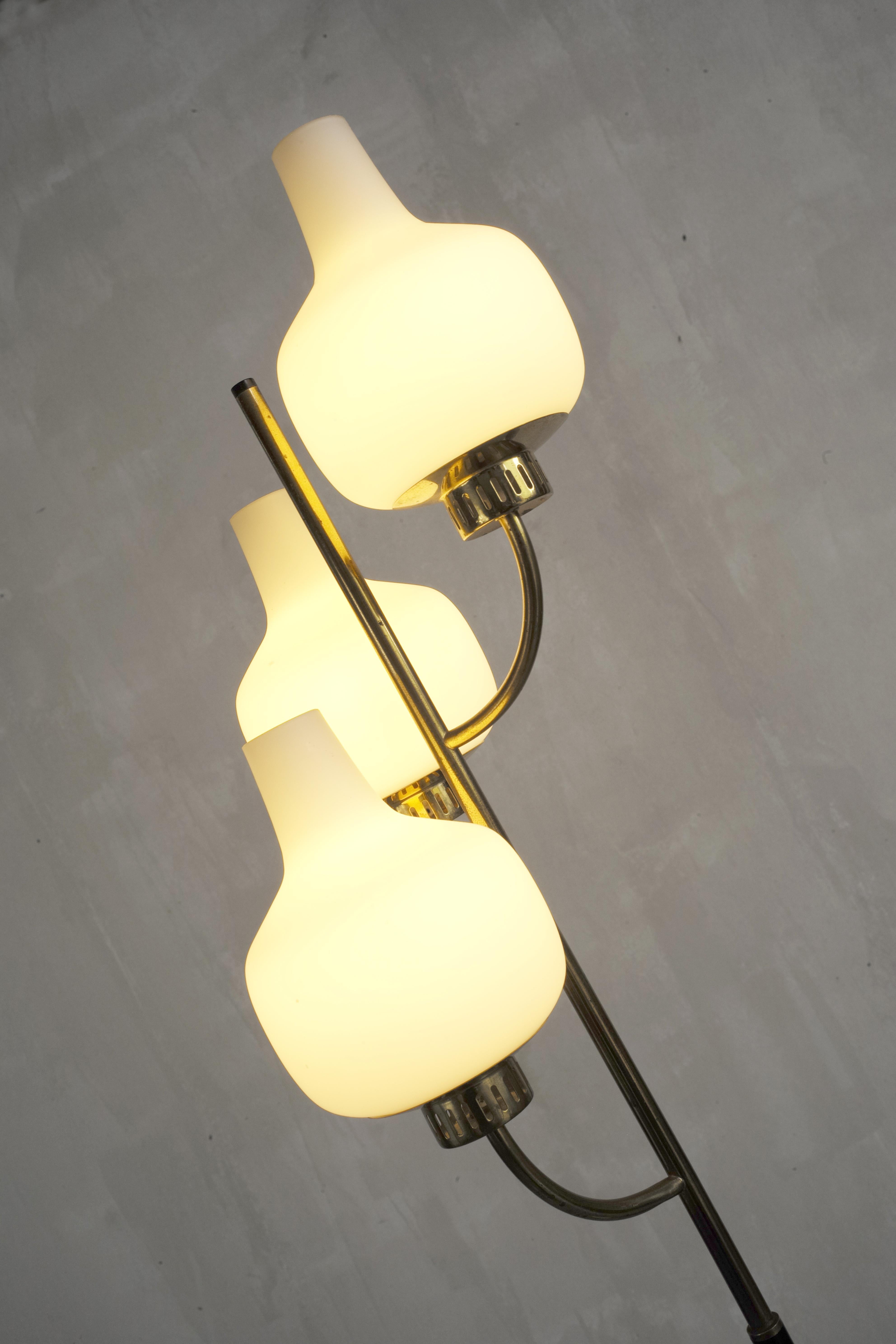 Stilnovo, Large three-light floor lamp, Italy 1950. White marble base, black and gold lacquered brass shaft, sandblasted opaline reflector. 
Electricity redone.