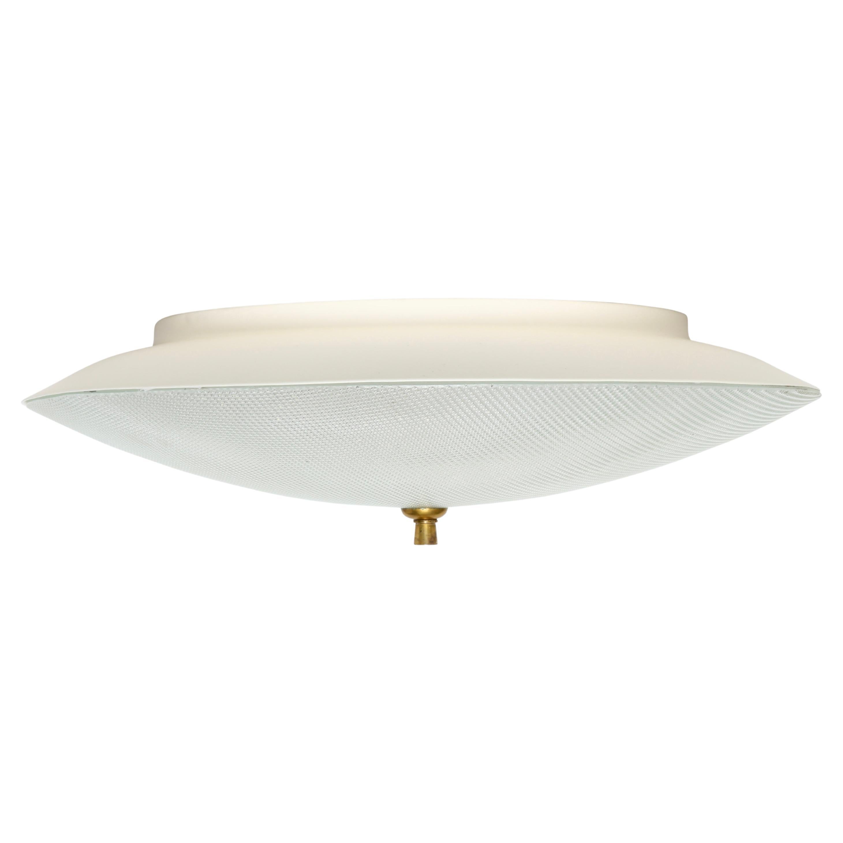 Lampada da soffitto a incasso Stilnovo
Realizzato in Italia negli anni '60.
Vetro testurizzato, metallo smaltato, ottone.
Ognuno di essi può contenere 3 lampadine a base media.
Cablaggio USA gratuito su richiesta.
Il prezzo si riferisce a 1