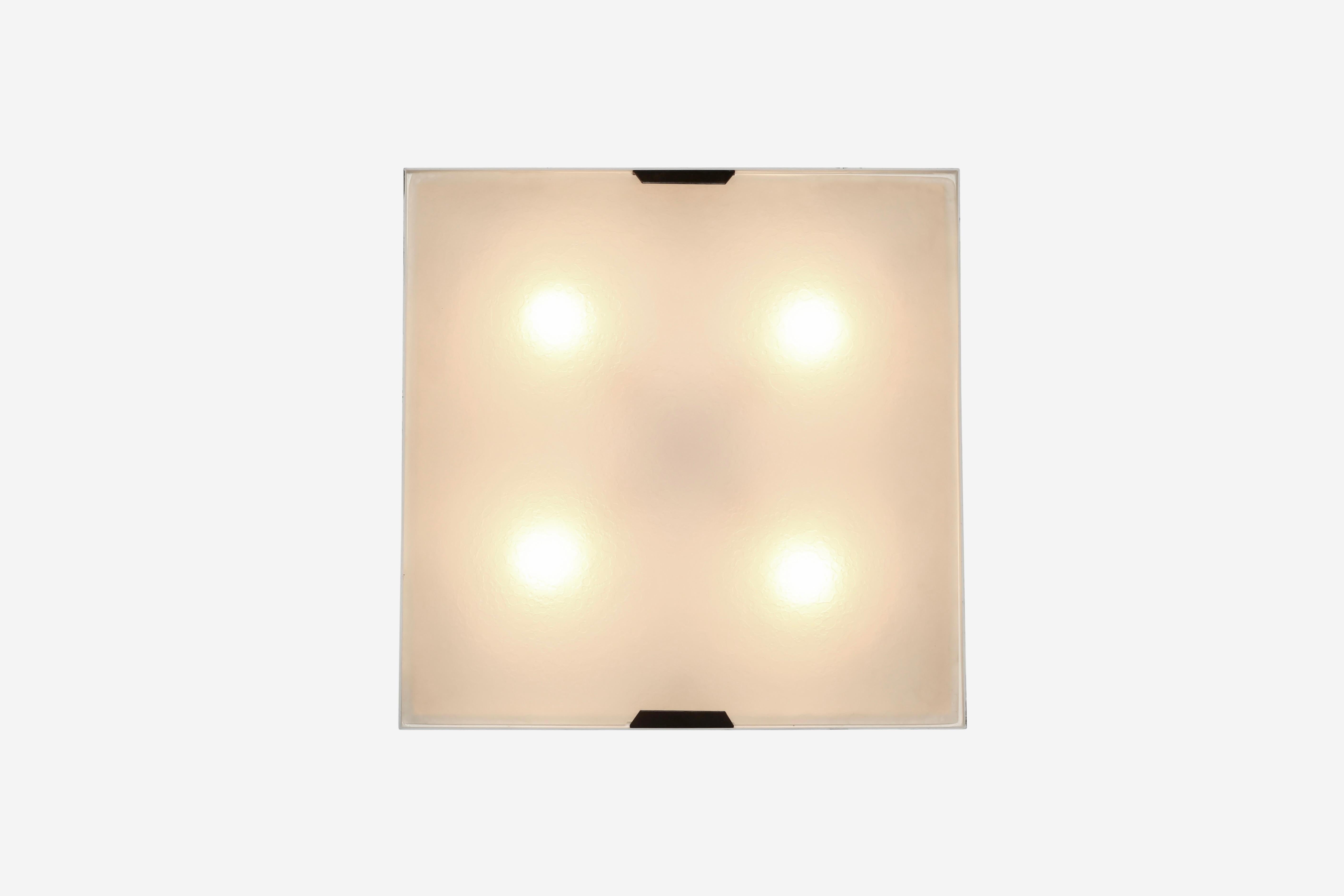 Stilnovo flush mount or wall light.
Designed and manufactured in Italy in 1960s.
Intricate textured glass, brass and enameled metal frame.
Four candelabra sockets.
Complimentary US rewiring upon request.