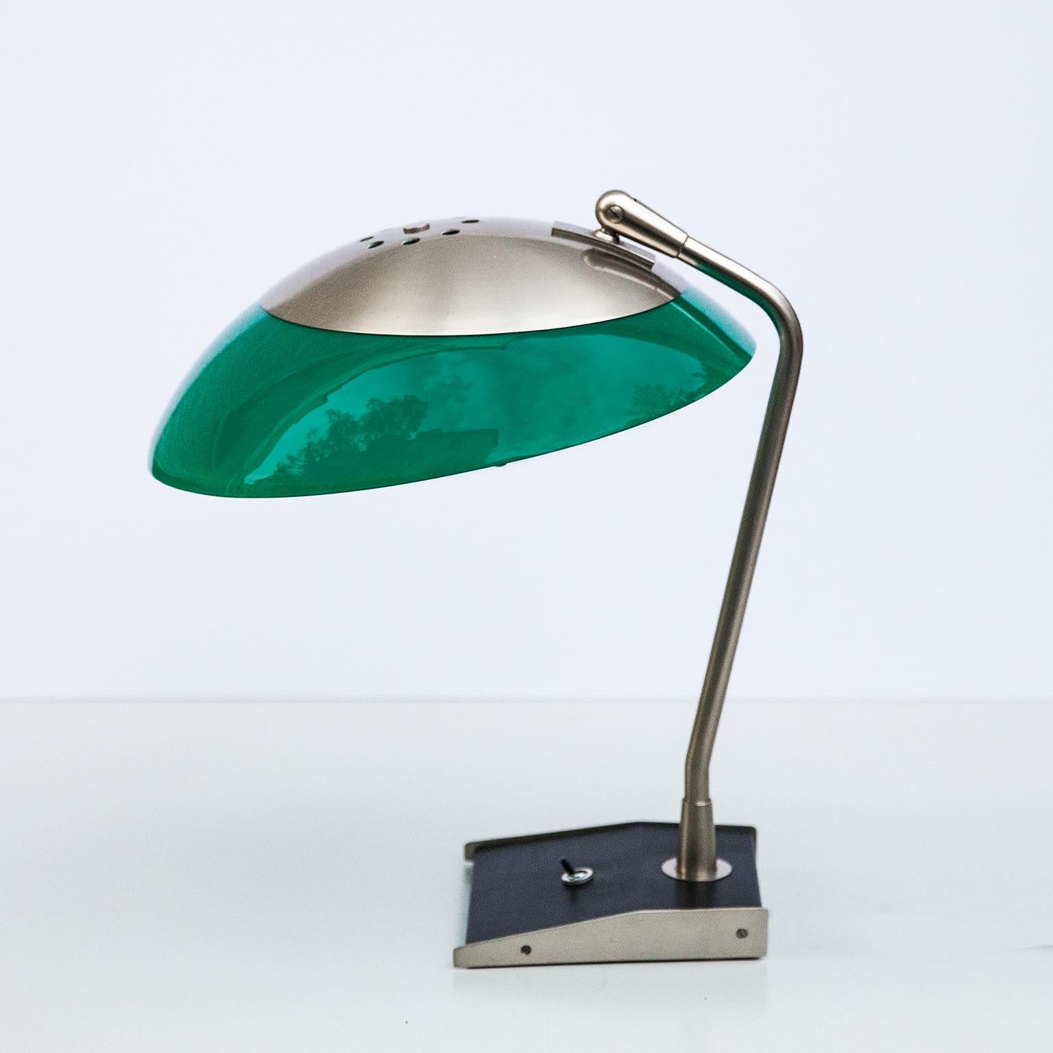 Stilnovo table or desk lamp with a black painted base and a white and green adjustable perspex shade. New wiring and plug, but the marked Stilnovo old plug is included.