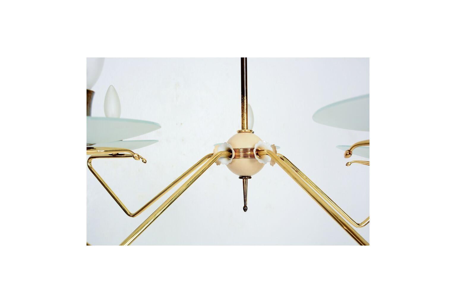 For your consideration a vintage Italian chandelier in excellent restored condition. Polished arms in solid brass with custom made glass diffusers in frost finish. Chandelier has been rewired and it is ready to go. Requires five (5) E-14 bulbs not