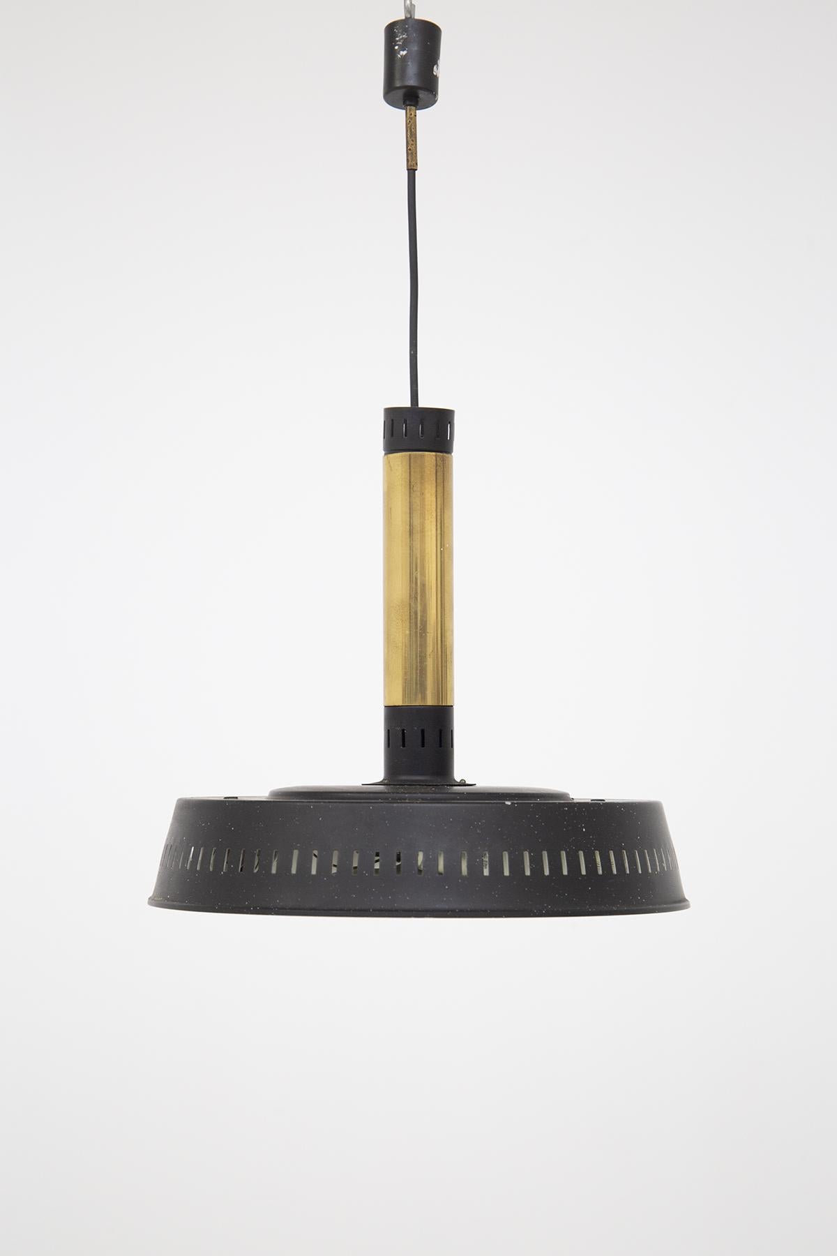 Modernist Italian manufacture pendant from the 1950s. The pendant is made of tubular brass. The ceiling light or lamp holder hat is made of black painted aluminum of circular shape. Below the ceiling light is frosted opal glass with a light ornament