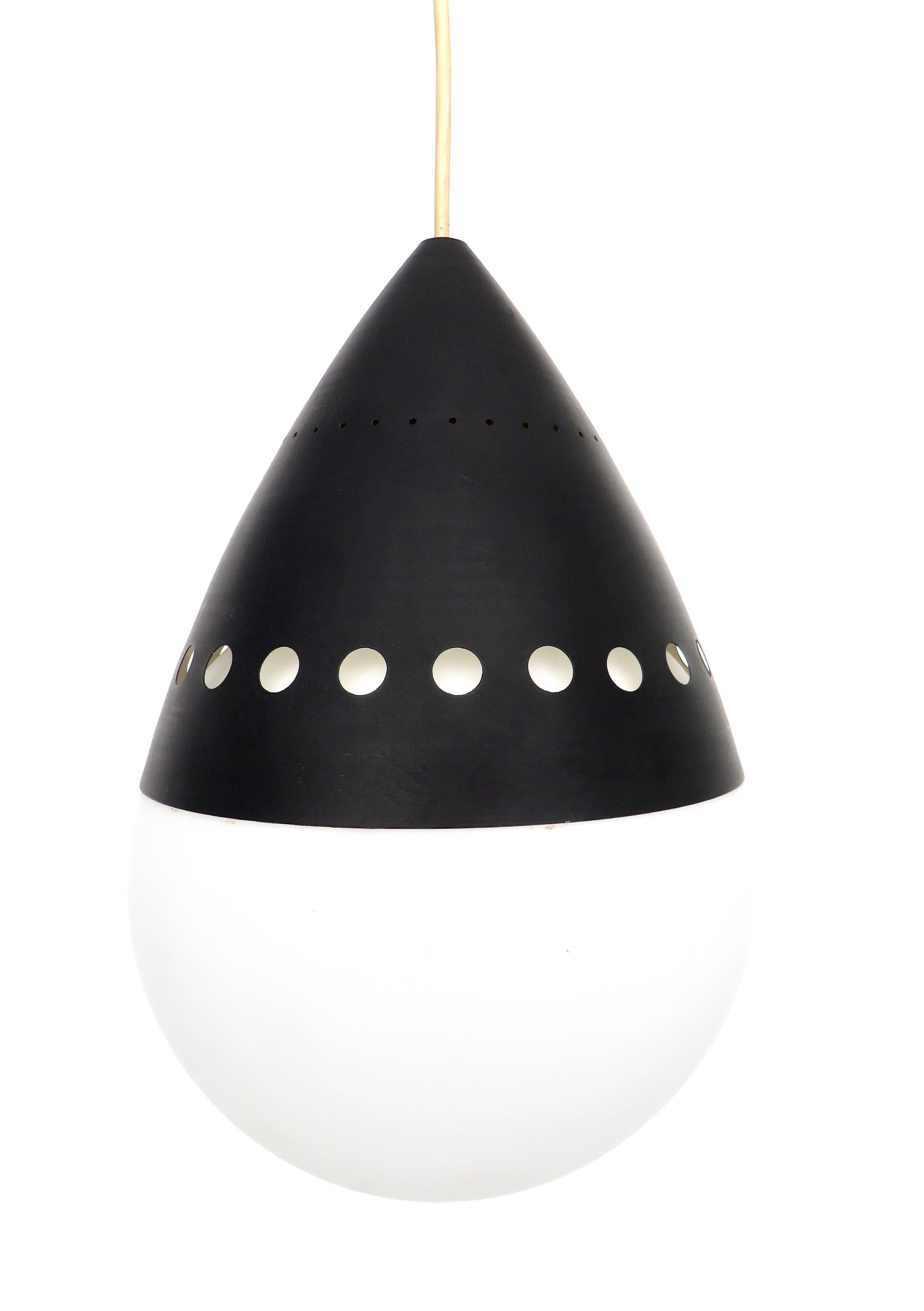 Pendant by Stilnovo designed and manufactured in Italy, circa 1960s.
Brushed satin opaque glass diffuser and lacquered black shade. Original ceiling cap.
Rewired for US junction boxes. Takes one E27 100w maximum bulb.
Overall size as shown: 9