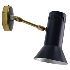 Stilnovo Wall Sconce in Black Metal and Brass, Italy, 1950s