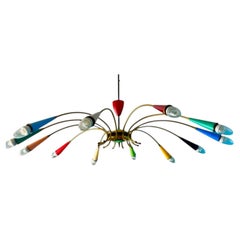 Grand lustre italien Stilnovo à 12 bras en laiton. Milan, Italie, années 1950