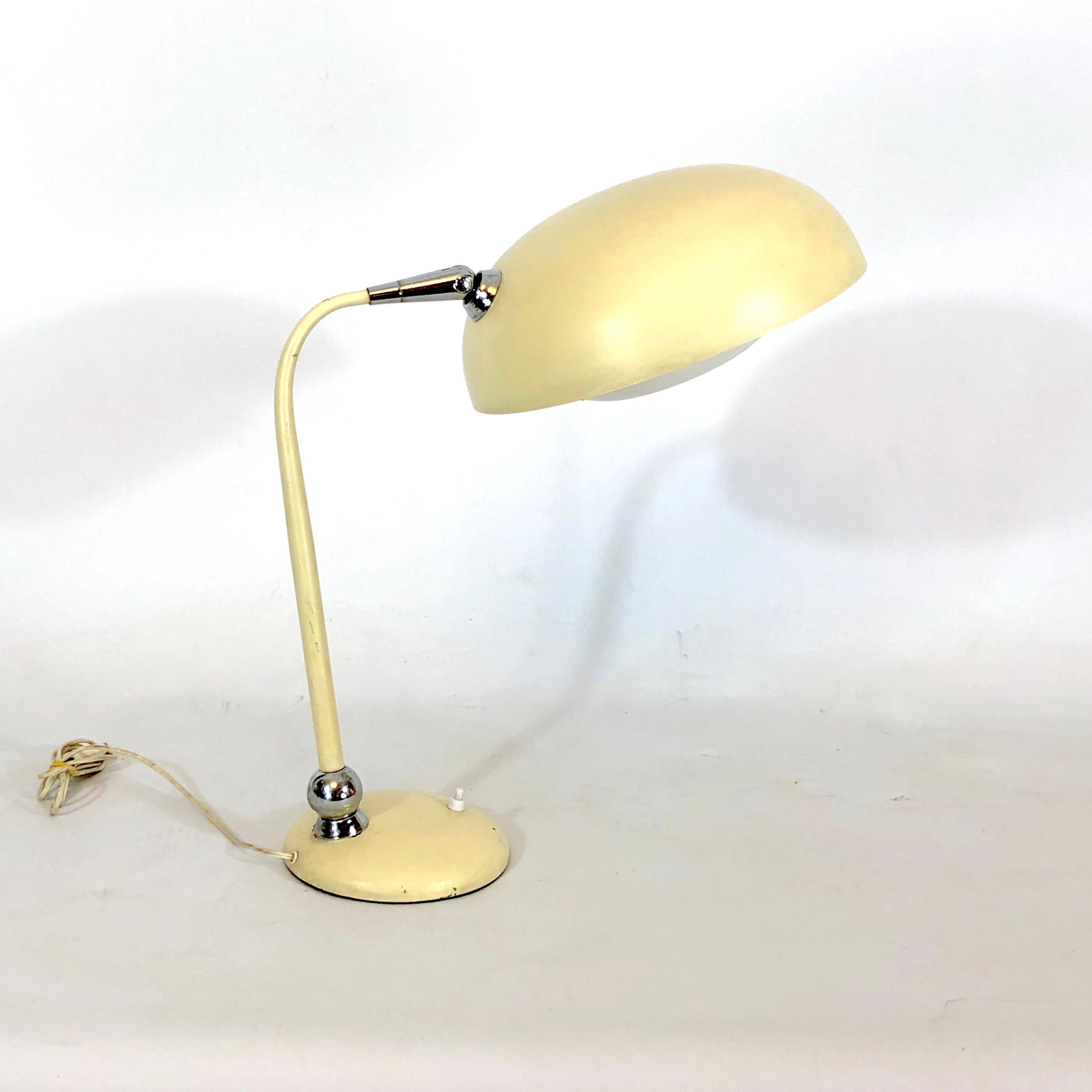 Good vintage condition with normal trace of age and use for this desk lamp produced by Stilnovo during the 50s. Very particular spheric joint on the base. Full working with EU standard, adaptable on demand for USA standard.