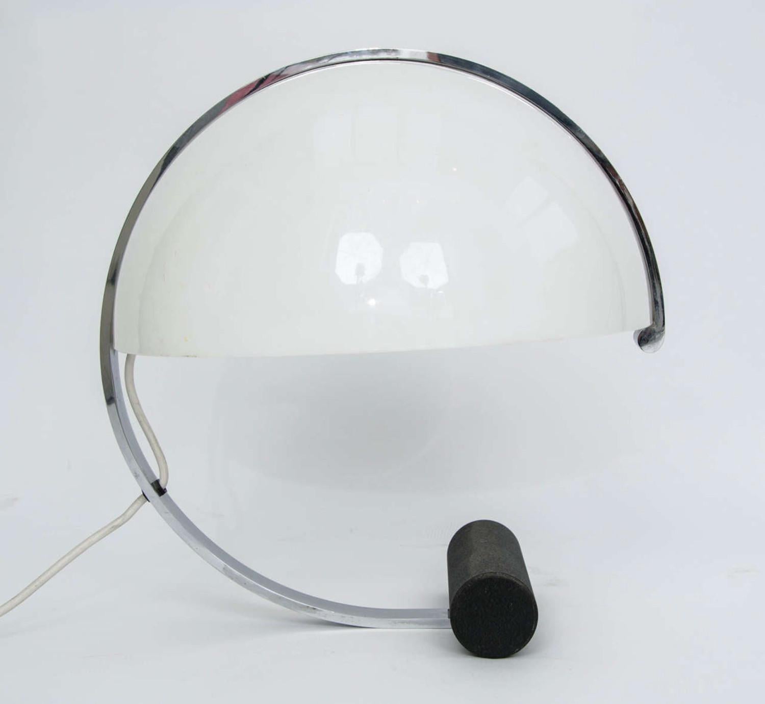 1970s table lamp with white acrylic shade, chrome frame and heavy black steel base. A high quality piece by Stilnovo of Italy. This design was distributed by the Dutch company Artimeta, and featured in their catalogue. The white acrylic shade