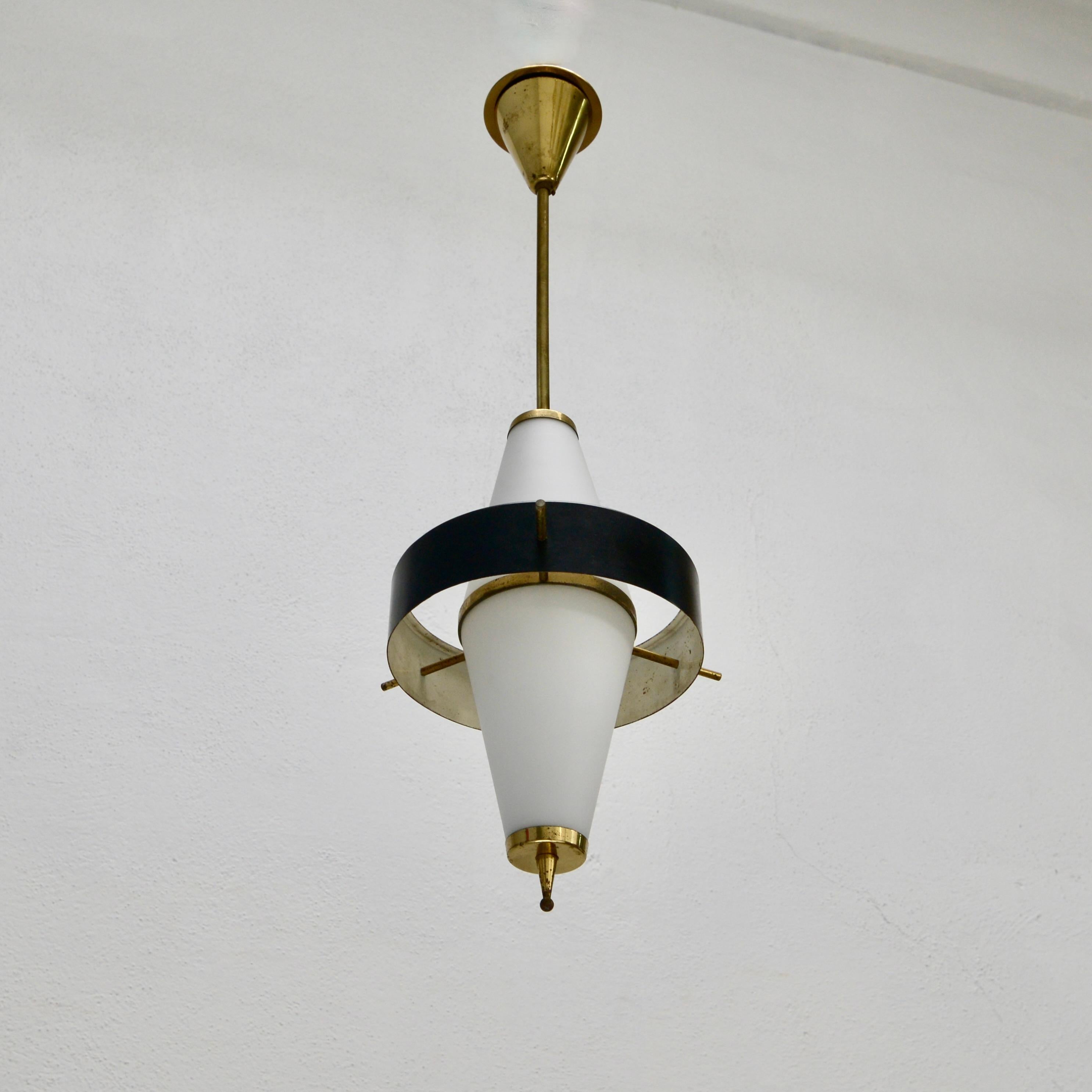 A stunning 1950s glass and brass Stilnovo pendant from Italy, Partially restored. Lightly patinated brass finish, painted steel and blown glass, wired with 1-E26 medium based socket for use in the US. Light bulb included with order.
