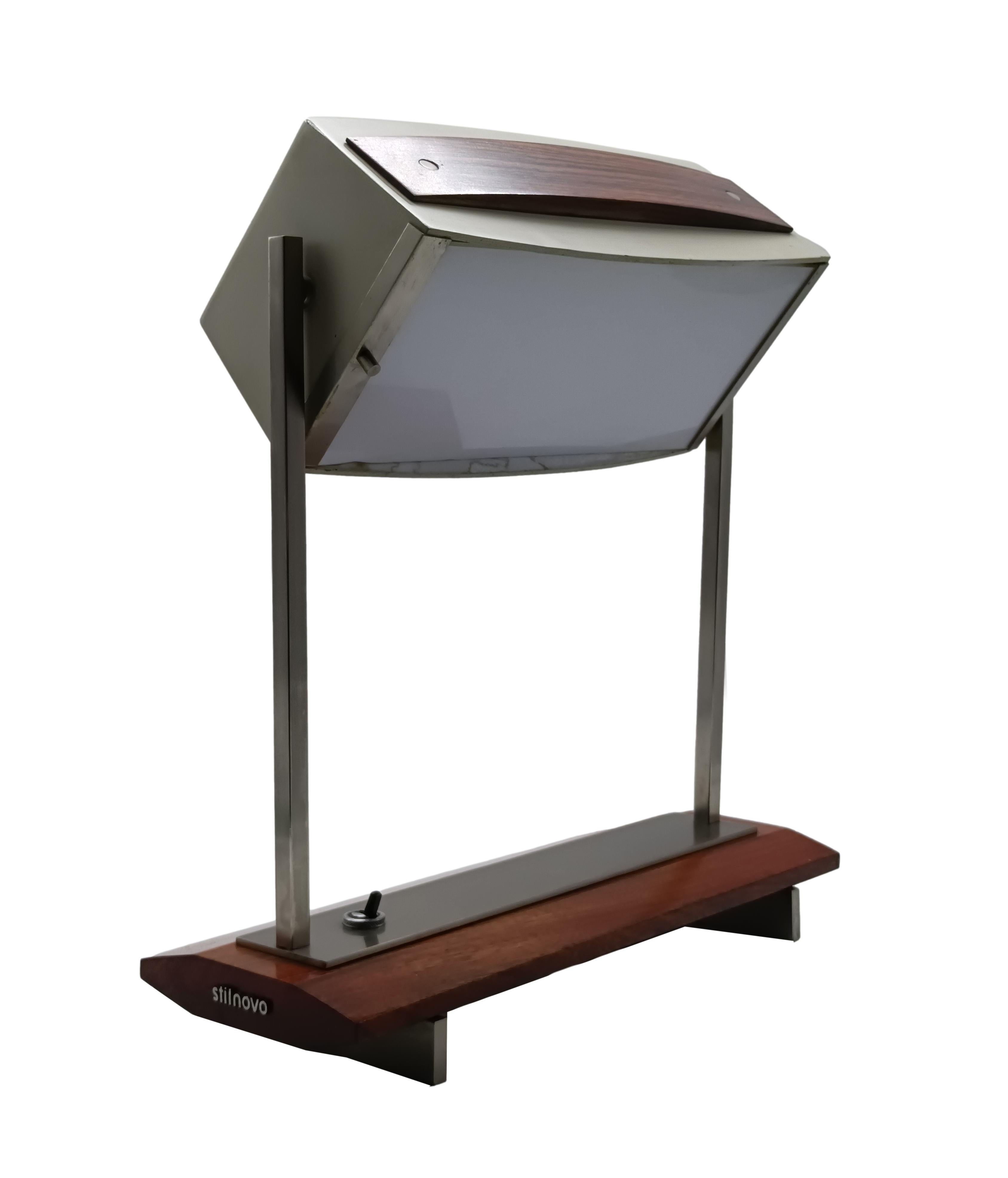 Table lamp mod. 8063. Nickel-plated brass, painted metal, glass diffuser, wood. Production Stilnovo 1960s. Stilnovo mark in relief on one of the sides Very good overall condition. Nickel-plated patina. Glass diffuser in very good condition.