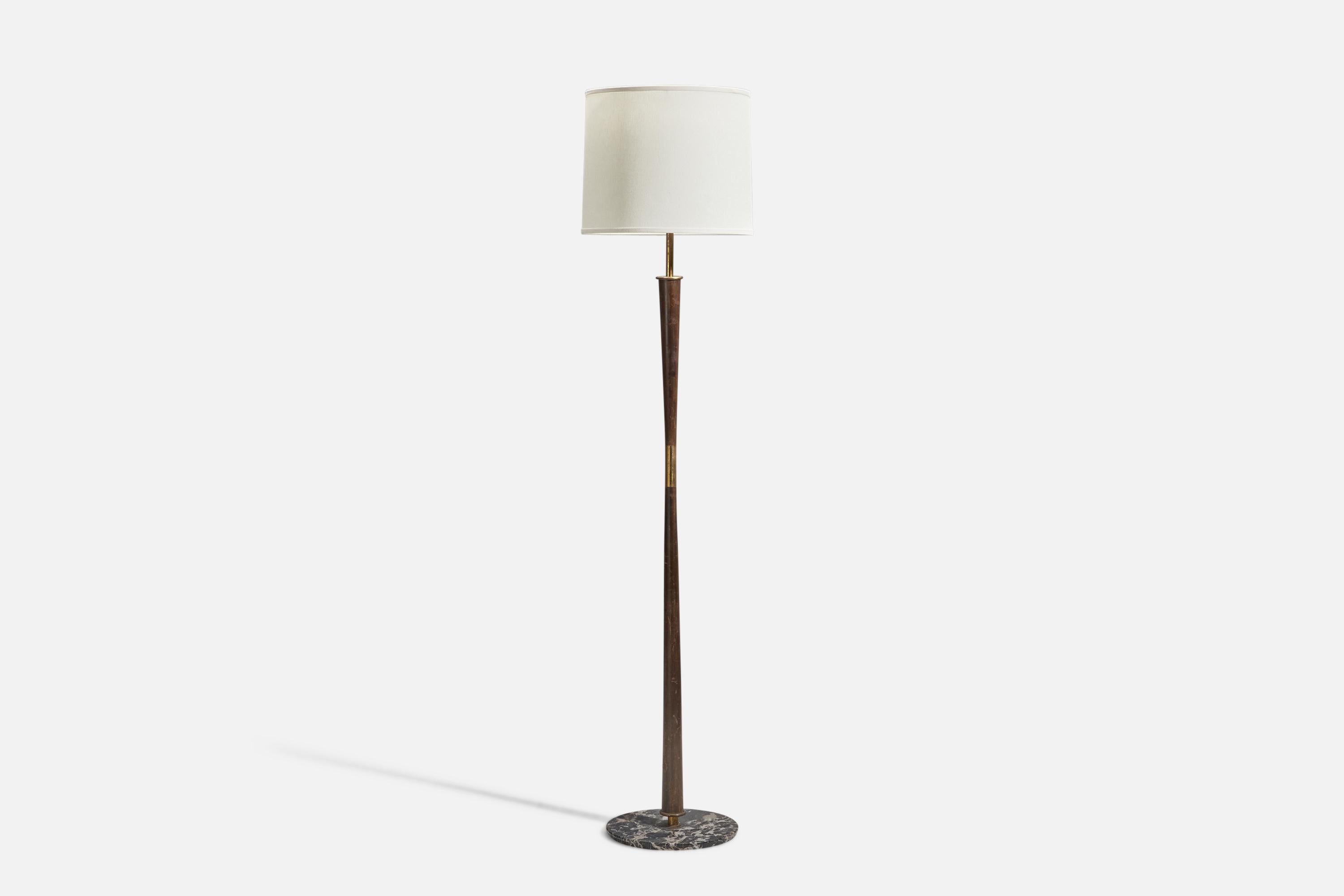 A brass, marble, wood and fabric floor lamp designed and produced by Stilnovo, Italy, 1950s.

Literature: Domus n. 244, March 1950, advertising

Sold with Lampshade. Dimensions stated are of Floor Lamp with Lampshade.

Sockets take standard E-26