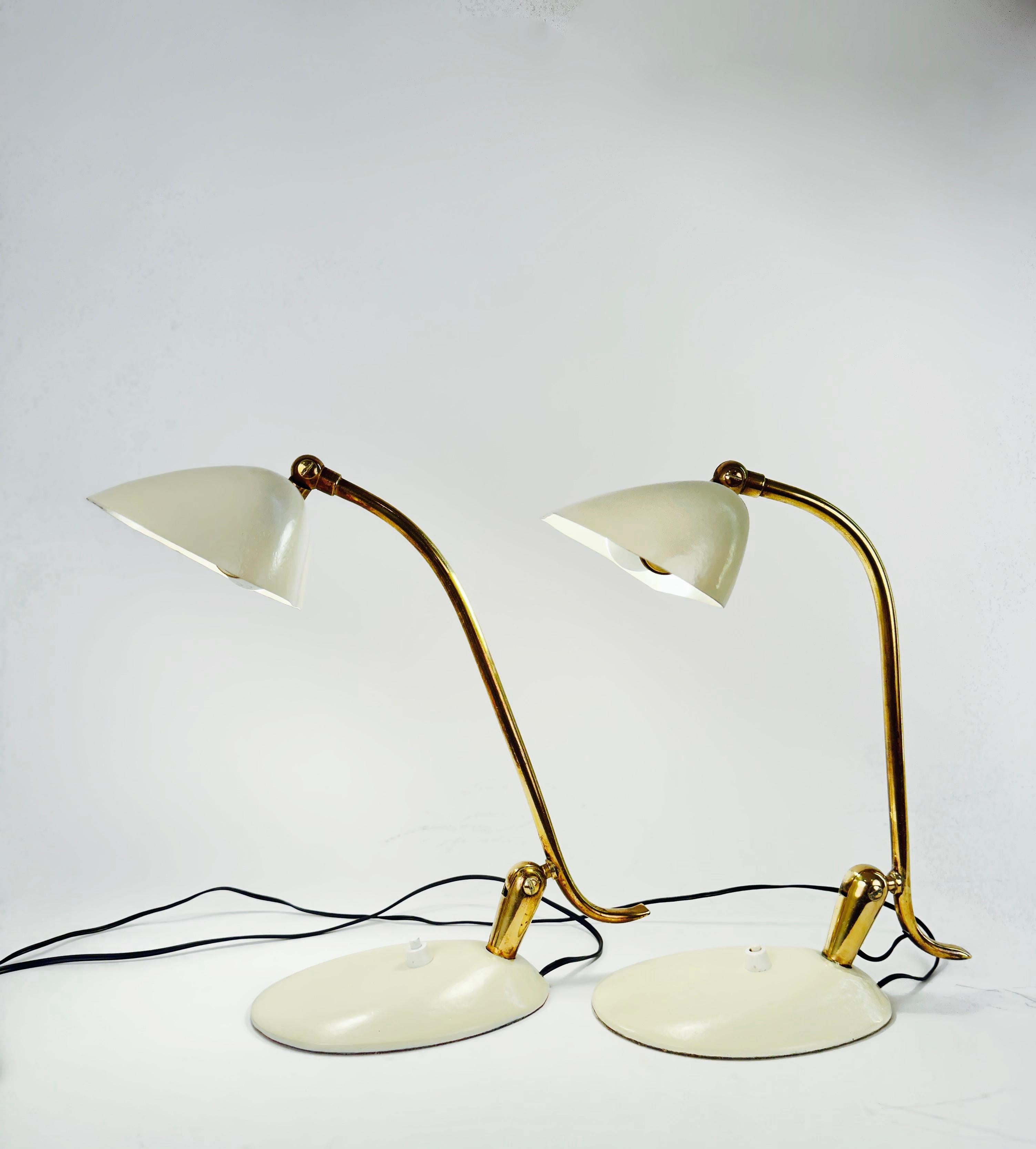 A pair of striking Stilnovo table lamps. Brass and enamelled metal. Excellent condition.