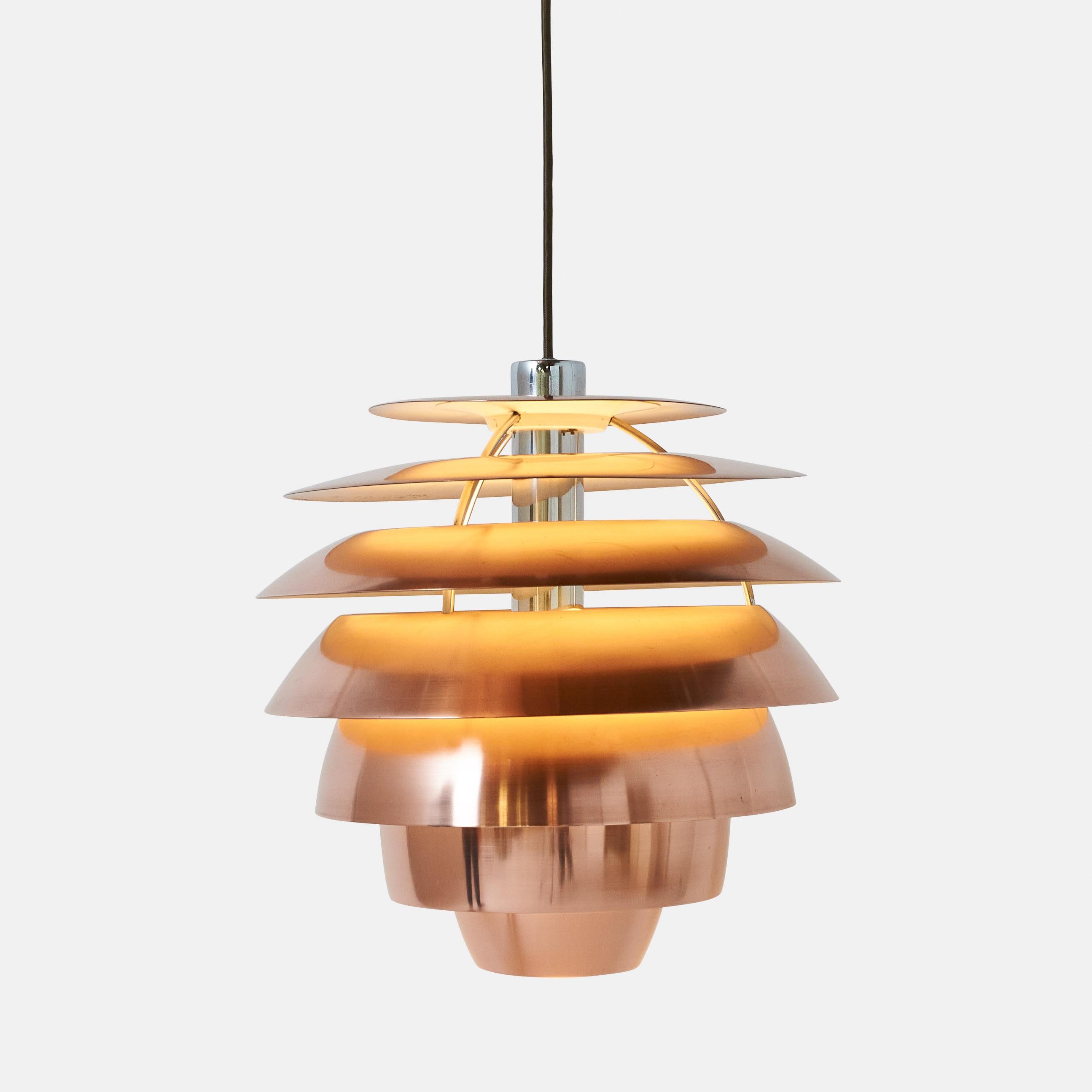 A model 1231 pendant by Stilnovo. Layers of brushed copper with white lacquer on the inside. Shaped like a beehive, there is a soft glow when lit. The copper layers have been restored and wiring is new. 