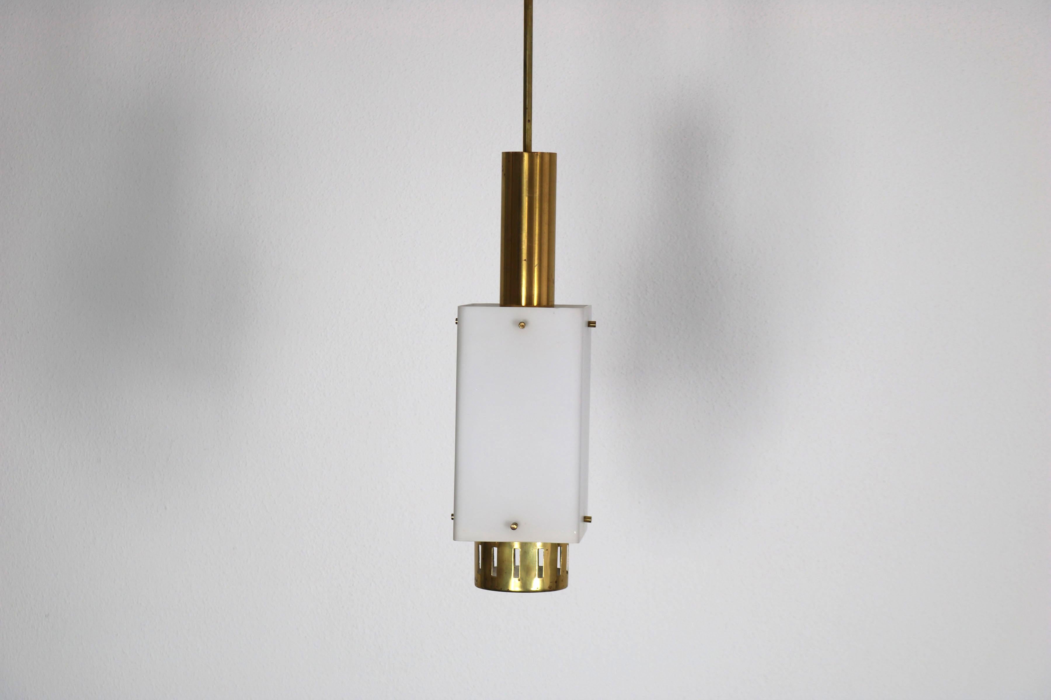 Stilnovo pendant lamp Italy, 1950s. The lamp has an opal glass shade and brass elements.

Feel free to ask for more information.

