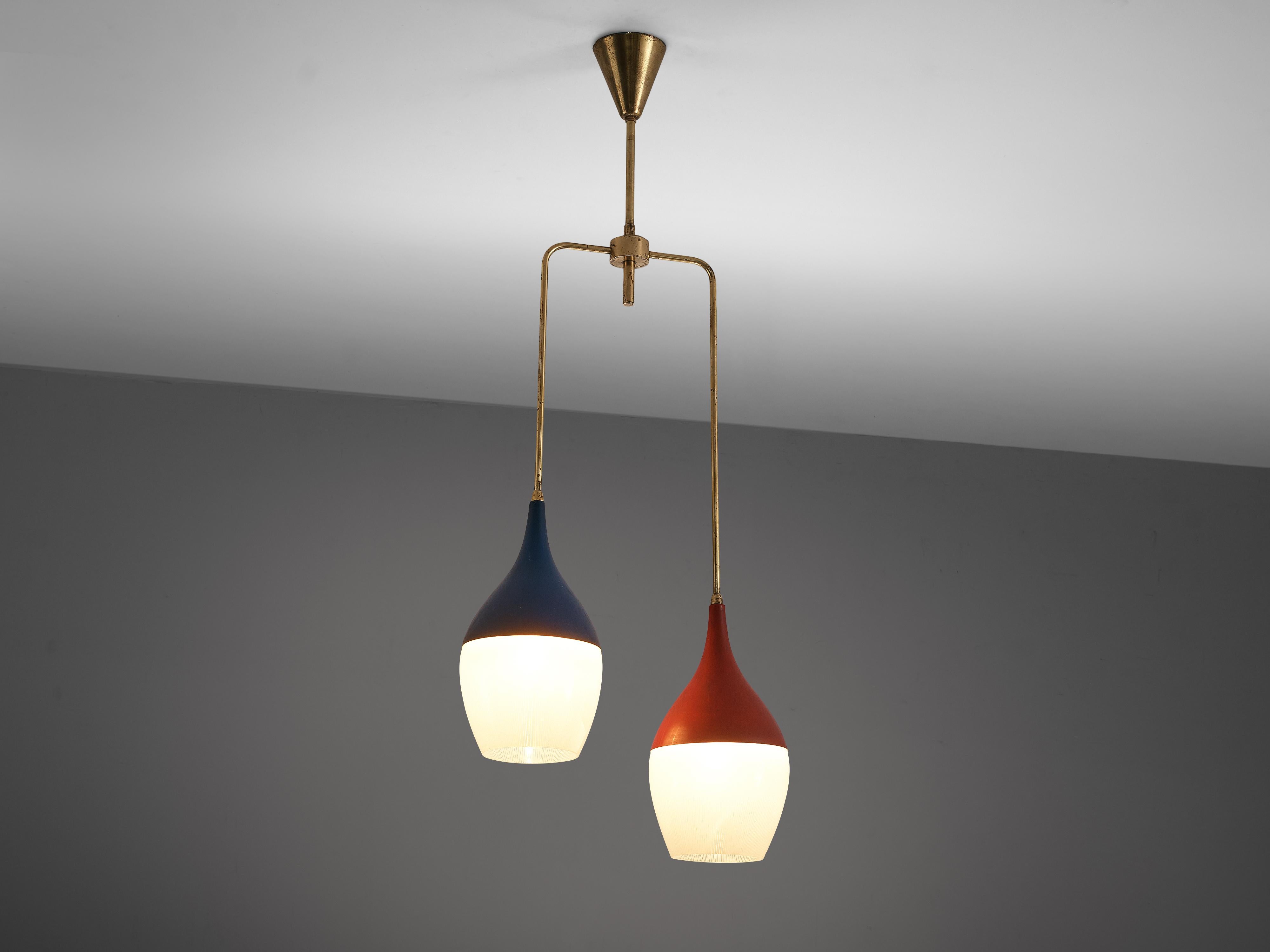 Stilnovo, pendants, metal, glass, brass, Italy, 1950s

Elegant pendant lamps by Italian manufacturer Stilnovo. The shades show beautiful curves: the narrow upper body with a blue and red top elegantly develops into a wider shape in off-white glass