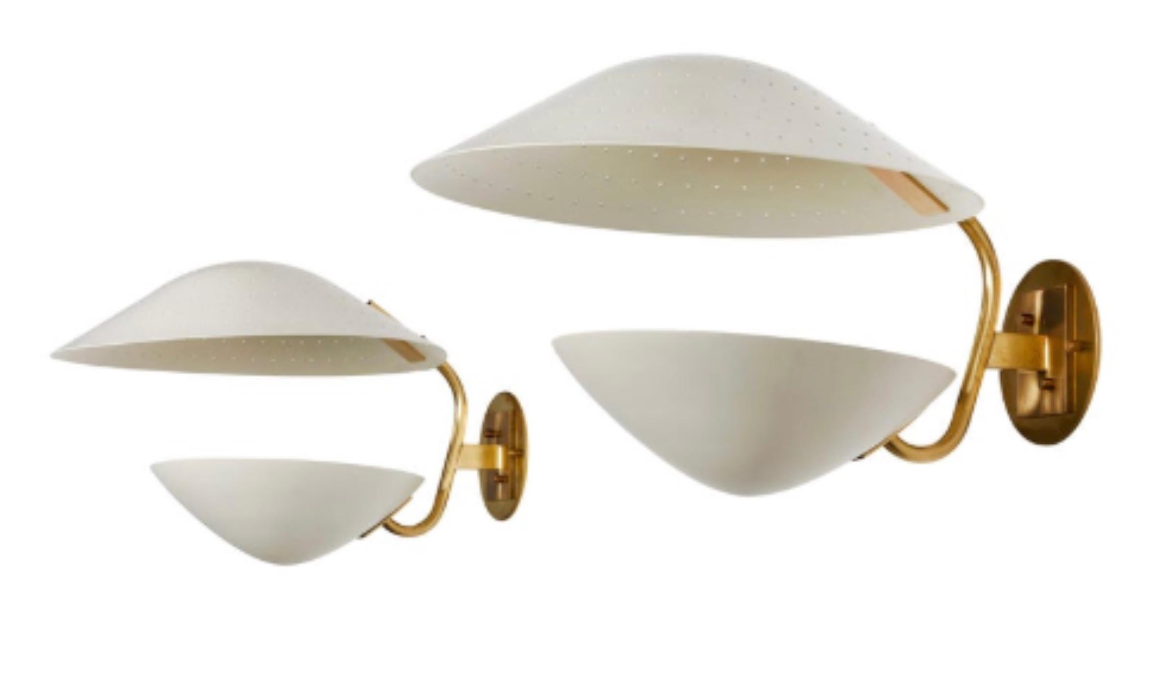 A captivating pair of Stilnovo Wall Sconces. The combination of white lacquer and brass accents creates a stunning visual contrast, making them a focal point in any room. With their sleek design and impeccable craftsmanship, they make a striking