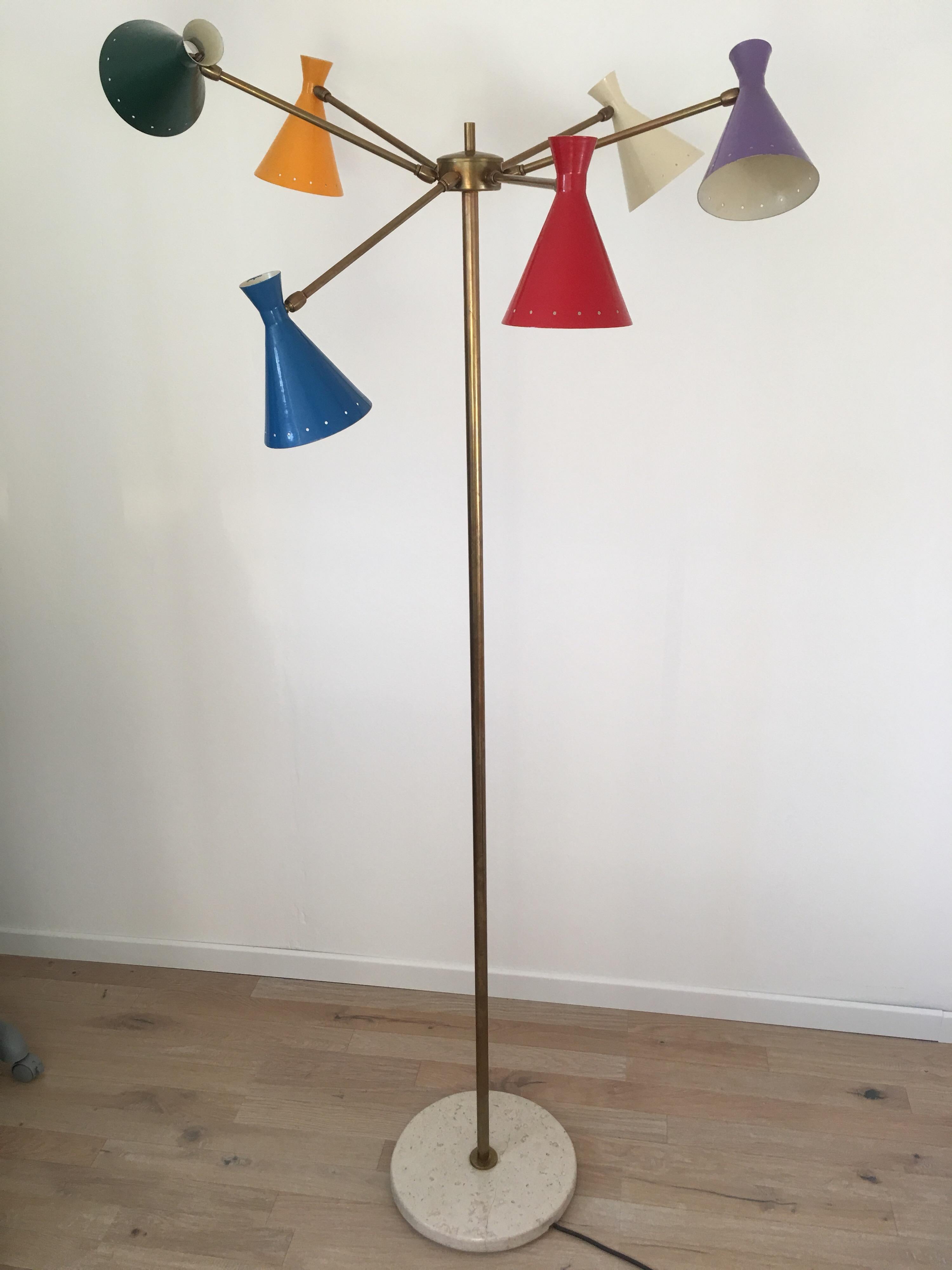 Rare marble and brass floor lamp designed by Stinovo in 1960s.
Each painted metal lampshade and each brass arm is adjustable thanks to a ball joint system. This ingenious system allows multiple lighting positions.
In very good condition, vintage