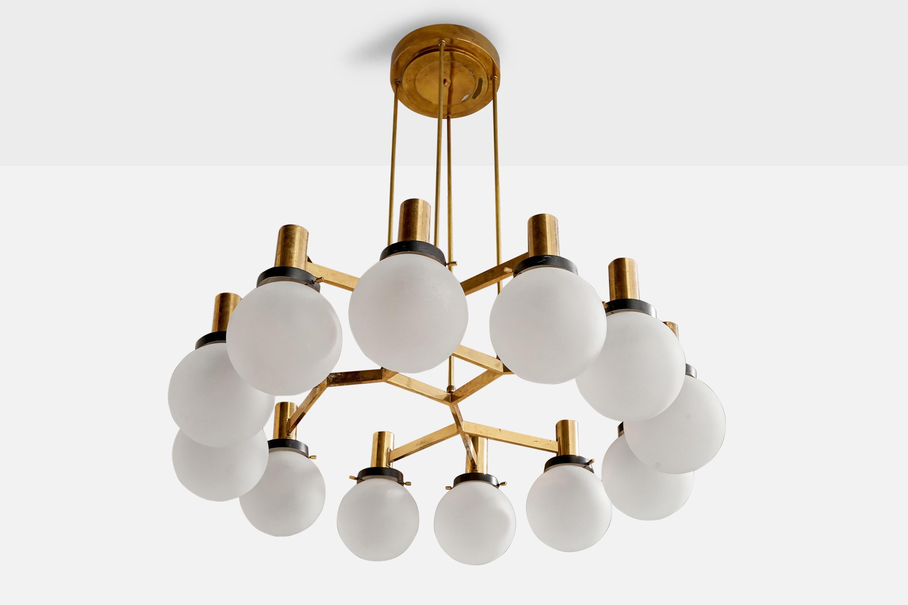 A sizeable 12-armed brass, black-lacquered metal and opaline glass chandelier designed and produced by Stilnovo, Italy, 1950s.

With makers mark. 

Dimensions of canopy (inches): 2.1” H x 5.45” Diameter
Socket takes standard E-26 bulbs. 4