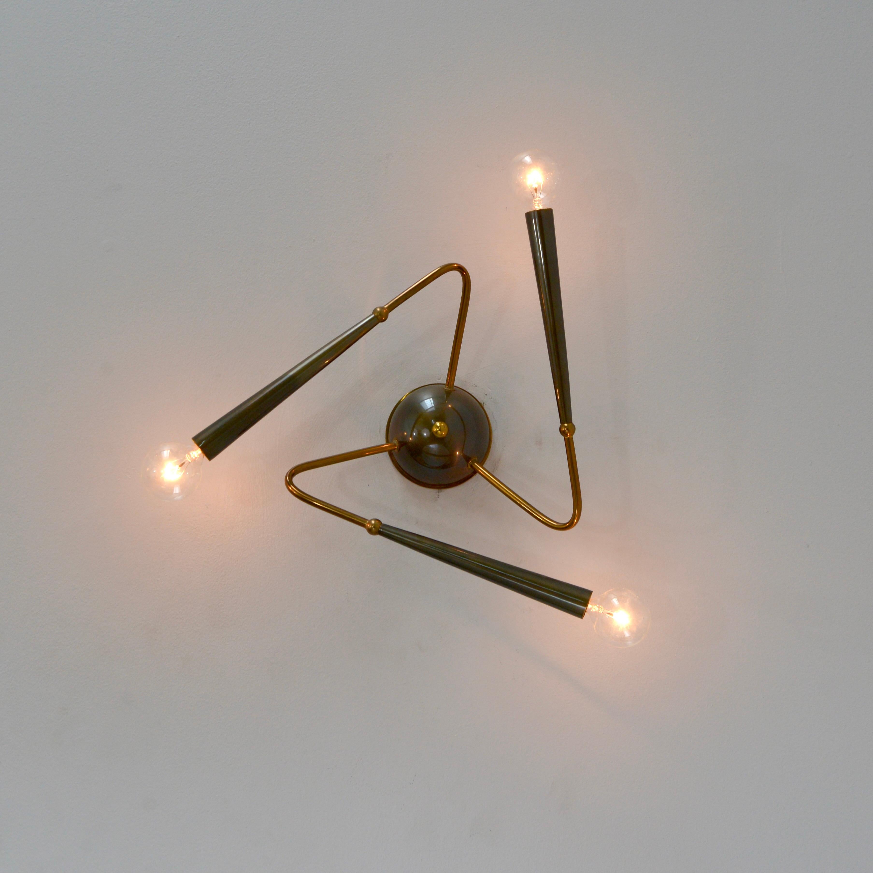 Wonderful  1950s brass Stilnovo Sputnik flush mount or wall fixture from Italy. Partially restored and rewired with 3 E12 candelabra based sockets, for use in the US. Original brass finish. Light bulbs and all mounting hardware included with order.