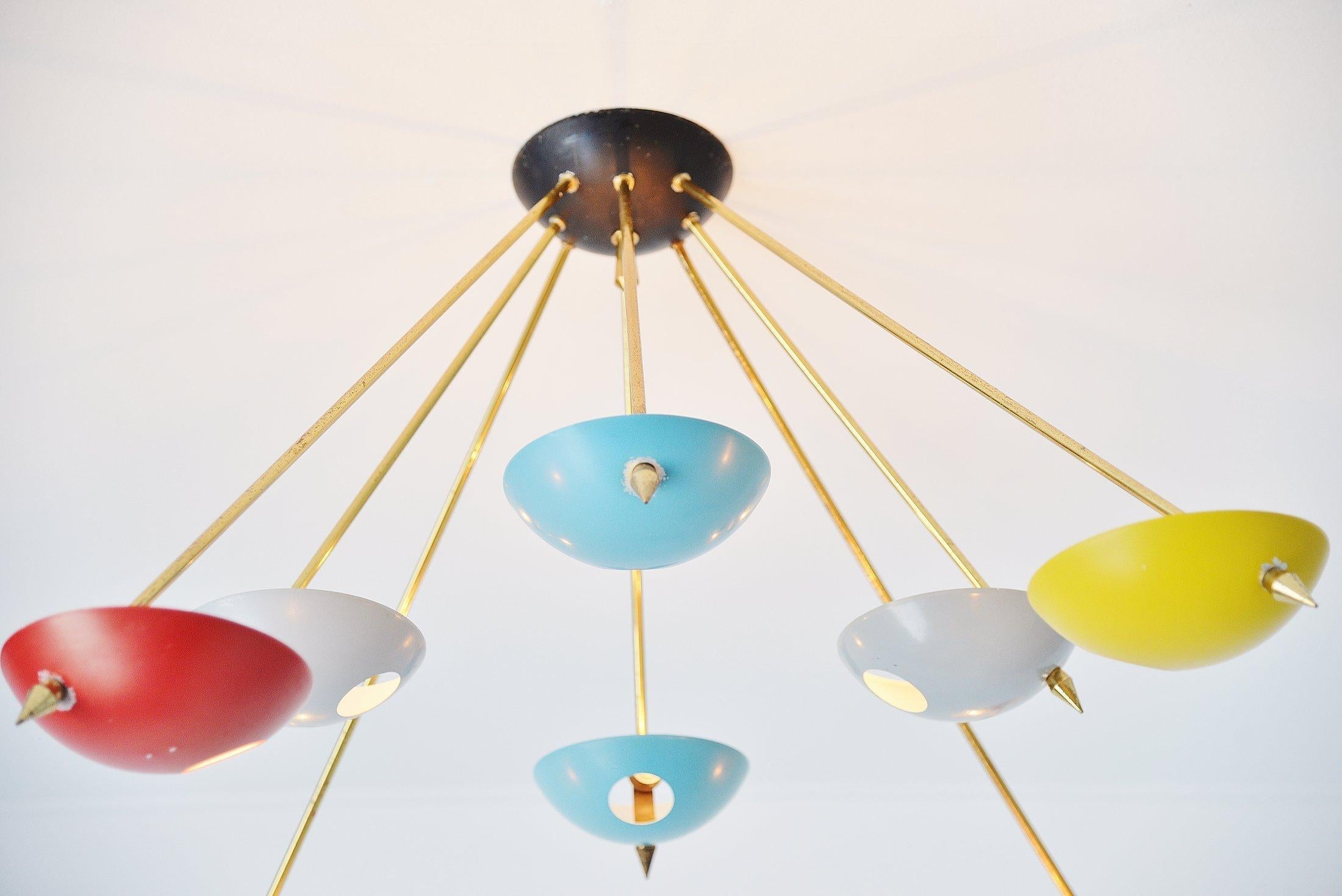 Fantastic Sputnik starburst ceiling lamp designed and manufactured by Stilnovo, Italy, 1950. This lamp was made in the time when the Sputniks were launched into space. Many designers inspired their designs on the space ships. This is in my eyes one