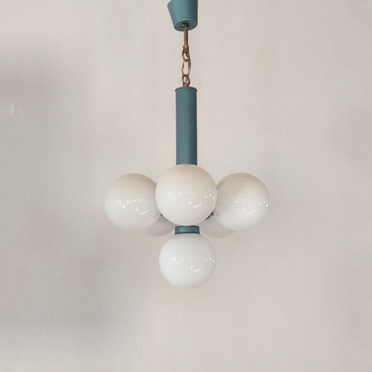 A beautiful Stilnovo style hand blown opaline glass six-light chandelier, Italy, 1960s. Enameled aluminum structure in petrol blue color and brass parts holding six hand blown opaline glass balloons in cluster shape. It takes 6 Edison E14 screw