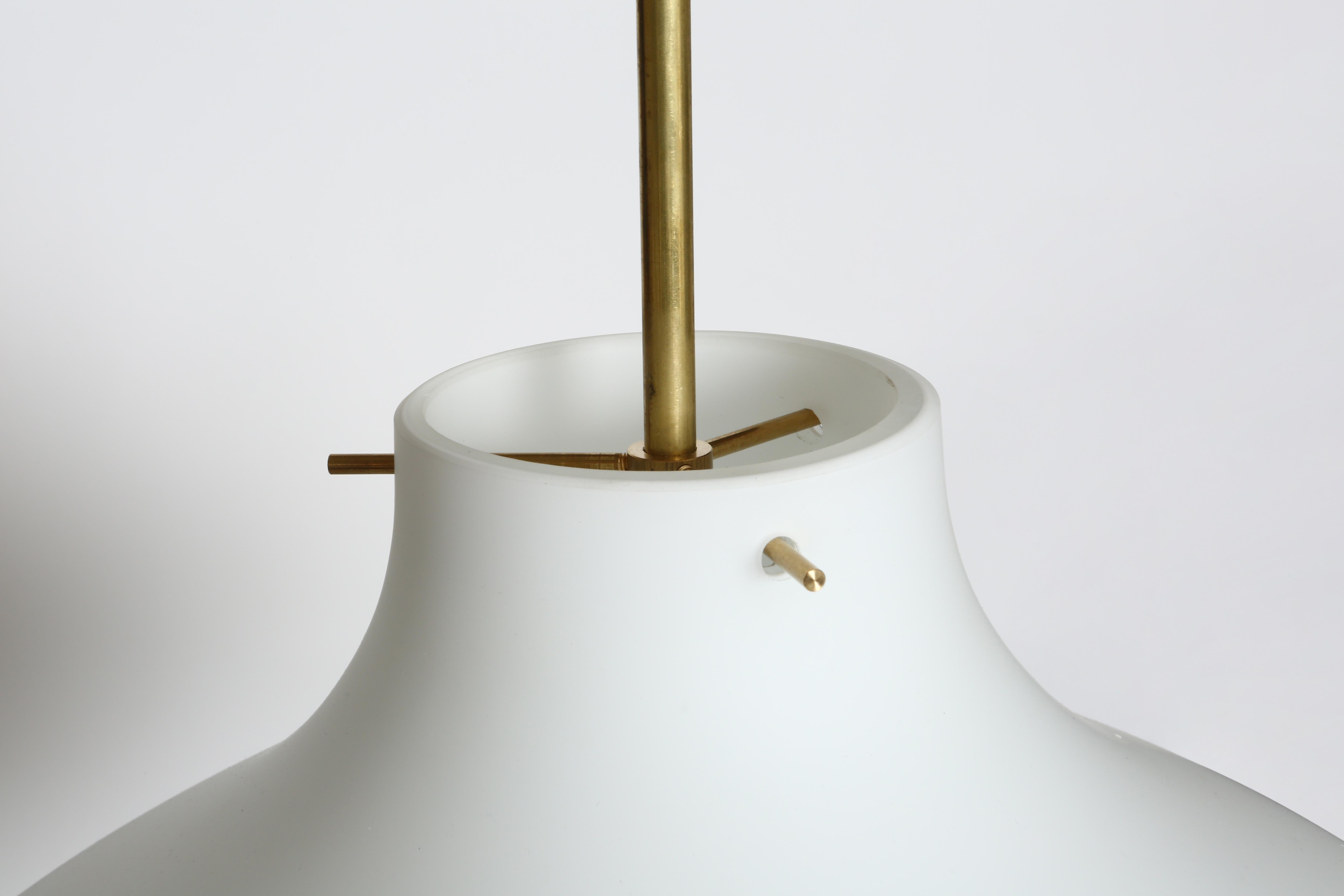 Stilnovo style ceiling pendant.
Opaline glass, brass.
Made exclusively for us in Italy.
Takes 1 Edison base bulb.
Complimentary US rewiring upon request.
1 pendant is in stock. More available.
Inquire about lead time.
Price is for 1 pendant.
Please