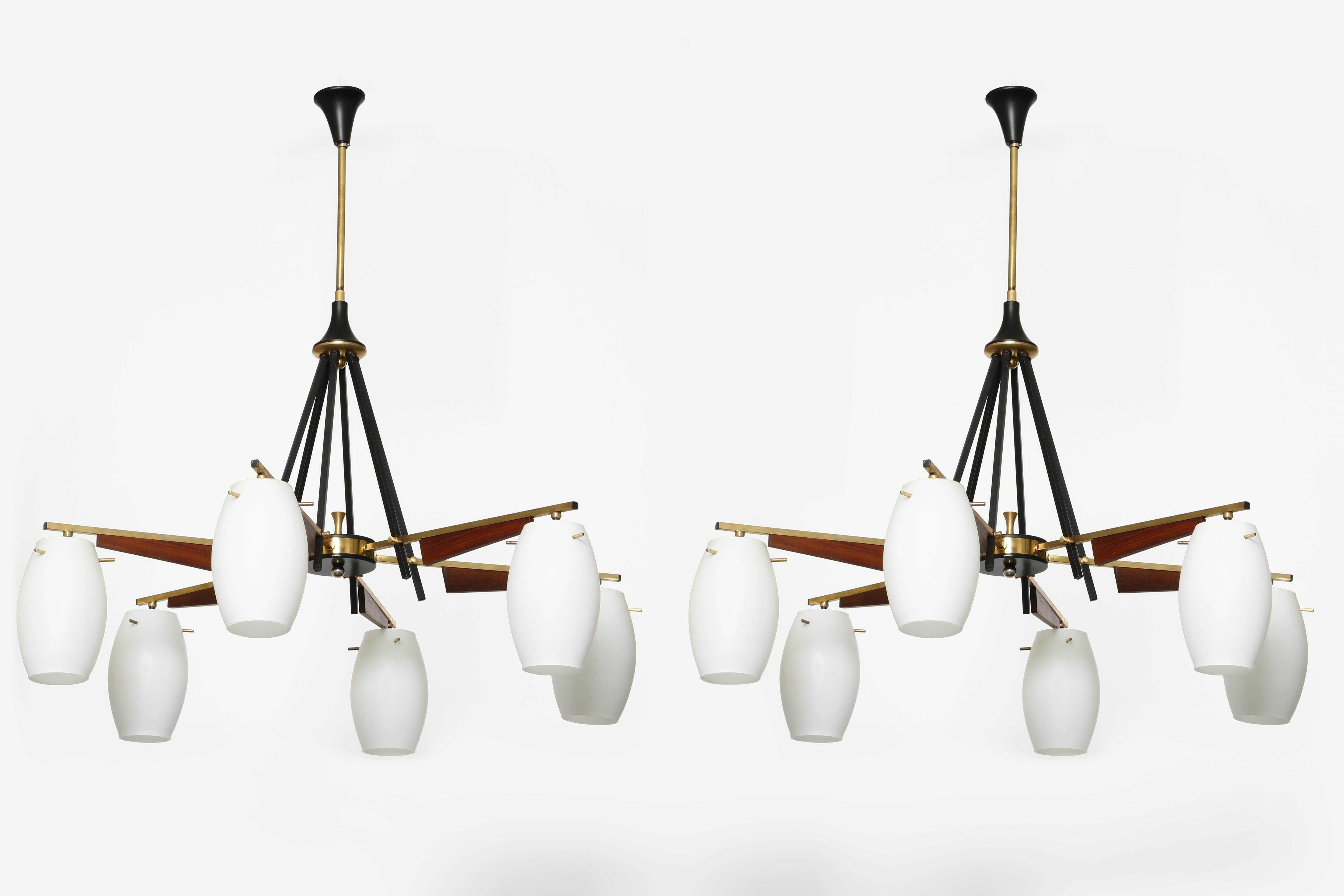 Stilnovo style chandeliers, a pair.
Italy 1960s
Six glass bells each.
 