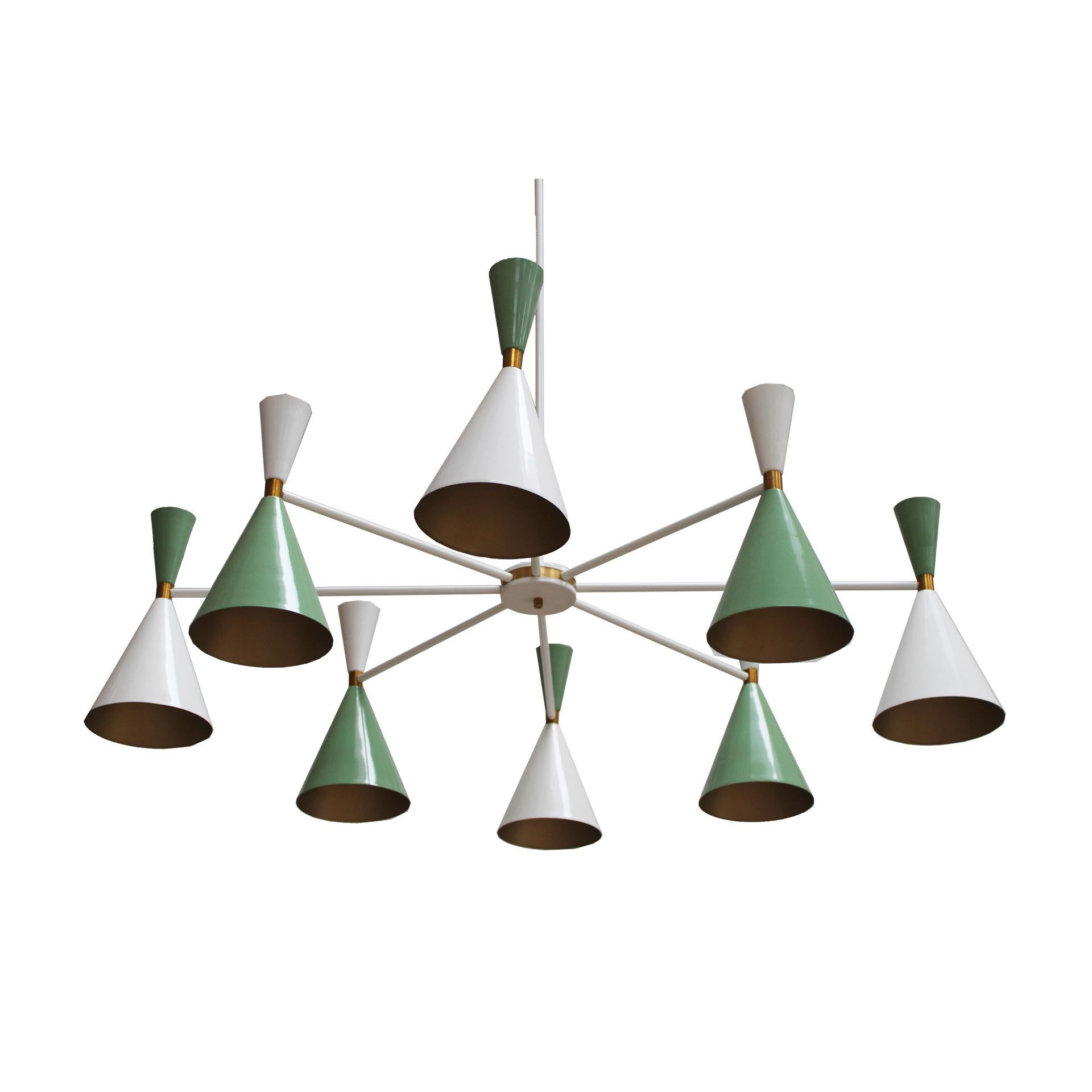 Pendant lamp, Stilnovo style. Composed of a radial structure with eight white lacquered arms and sixteen points of light with colored cups. Spain,

Dimensions: 150 x 150 x 160 (h) cm

*Bulbs not included

Every item LA Studio offers is checked by