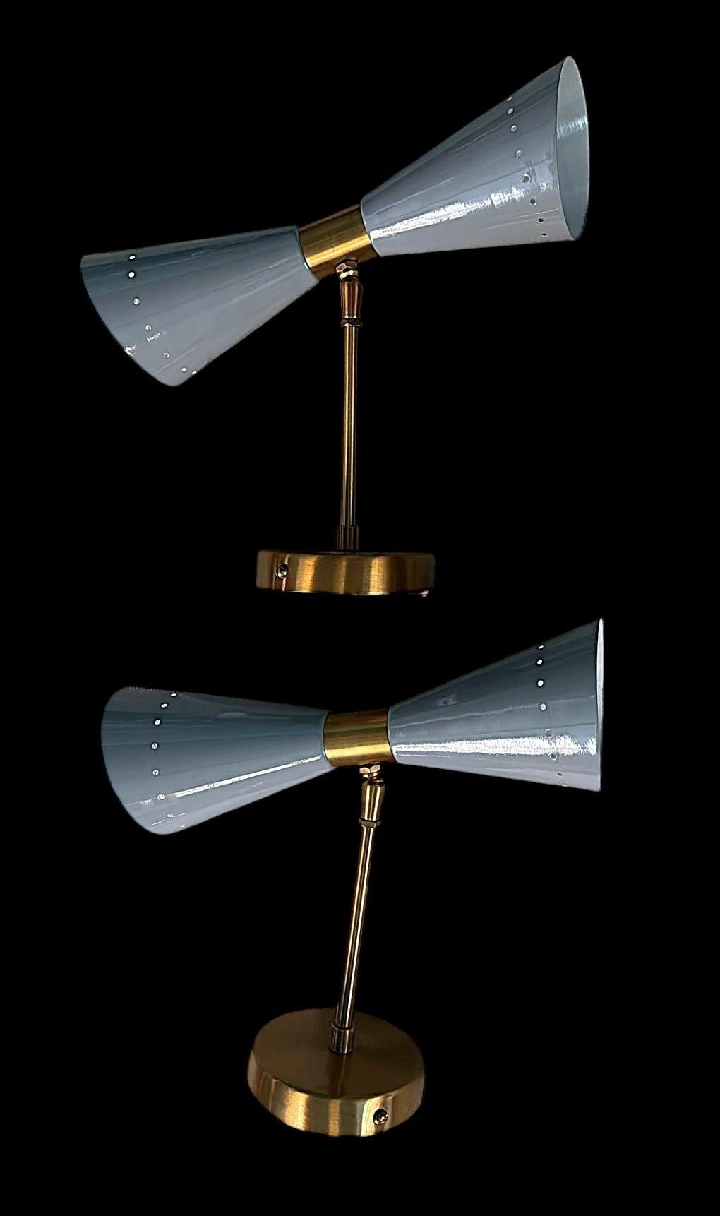 Mid-Century Modern Stilnovo Style Pair Of Italian Wall Sconces In Painted Metal And Brass For Sale